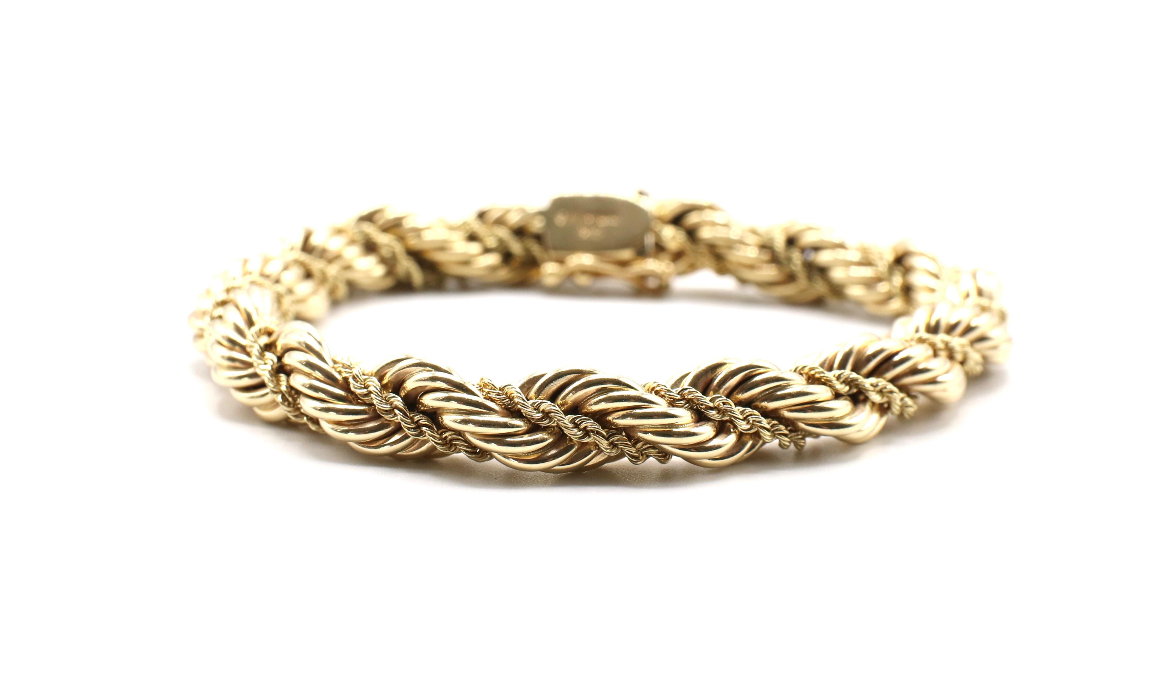 Vintage Tiffany & Co. 14K Yellow Gold Twisted Rope Bracelet 

Metal: 14k yellow gold
Weight: 22.32 grams
Length: 7.5 inches
Width: Approx. 7.2mm 
Signed: Tiffany & Co. 585
Recently polished