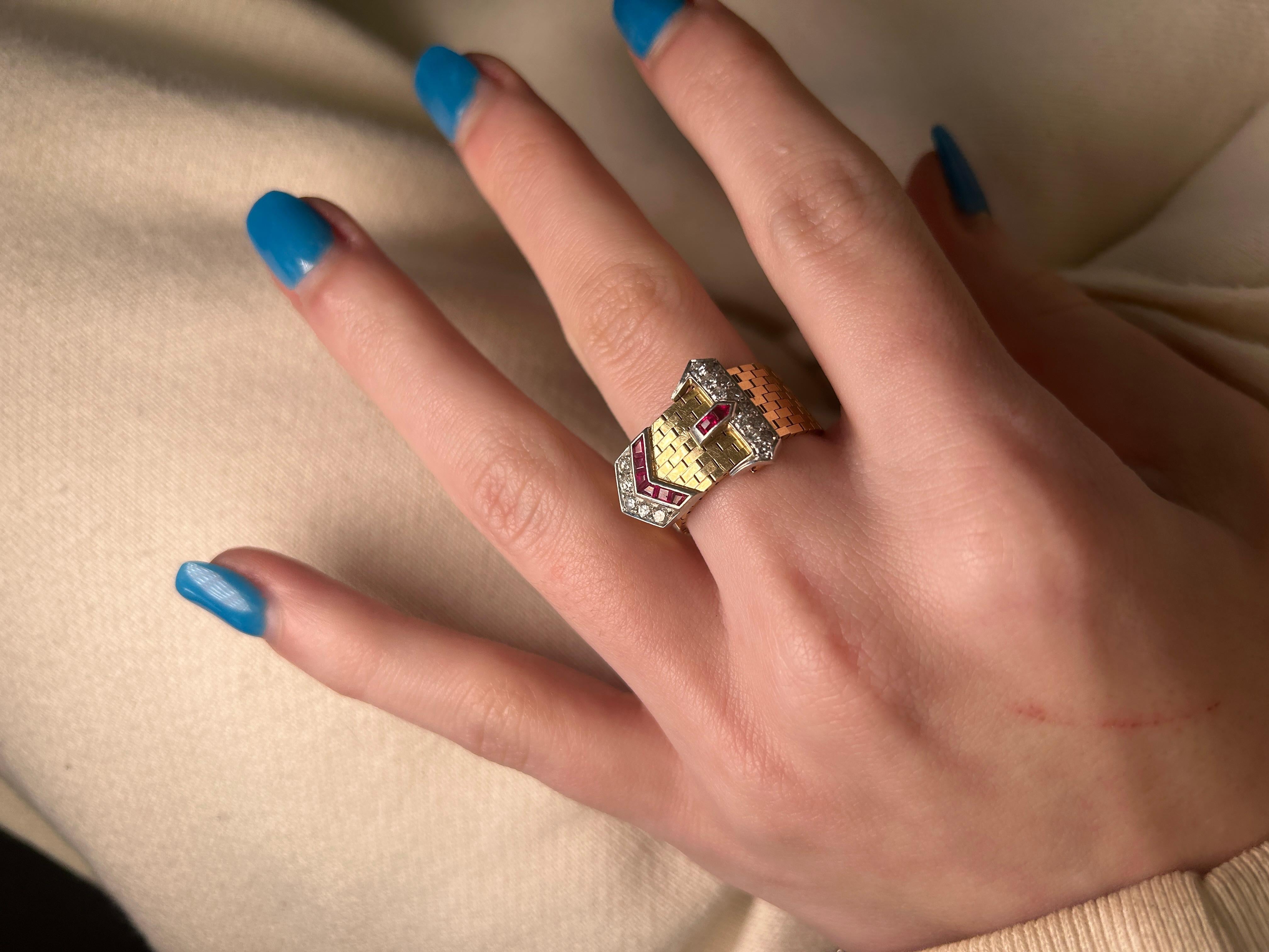 Year: 1960s

Maker: Tiffany and Co. (Hallmarked)

Item Details:
Ring Size: 4-9 (Adjustable between the belt holes)
Metal Type:  [Hallmarked, and Tested]
Weight: 10.6 grams

Diamond Details: .40ct total weight, Round Brilliant, E-F Color, VS