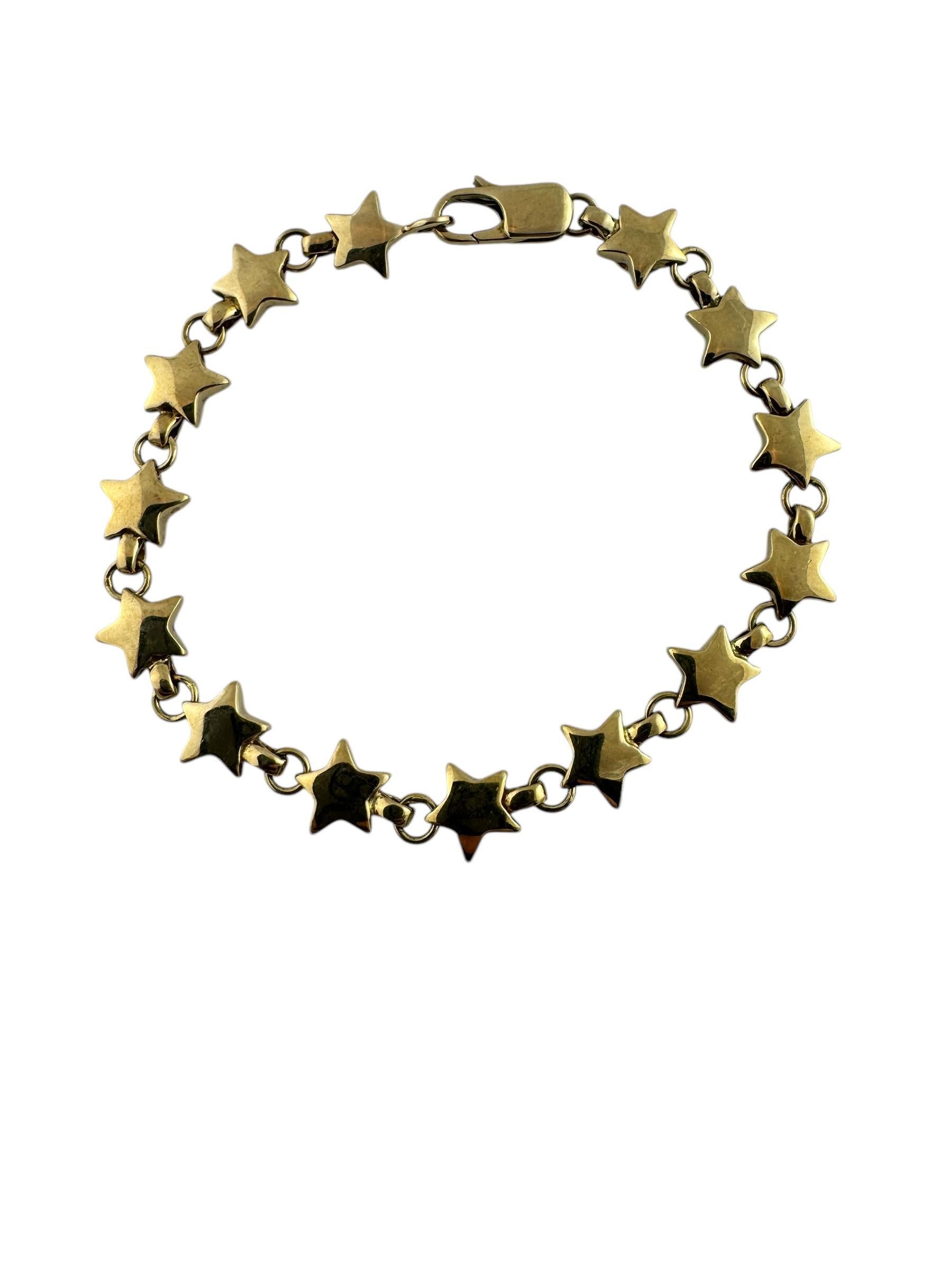 Vintage Tiffany & Co. 18K Yellow Gold Star Link Bracelet

This exquisite bracelet by Tiffany & Co.  features star-shaped links crafted from 18K yellow gold.

Length: 6.75 in

Width: 8.7 mm

Total Weight: 16.76 g / 10.78 dwt

Stamped T & Co.