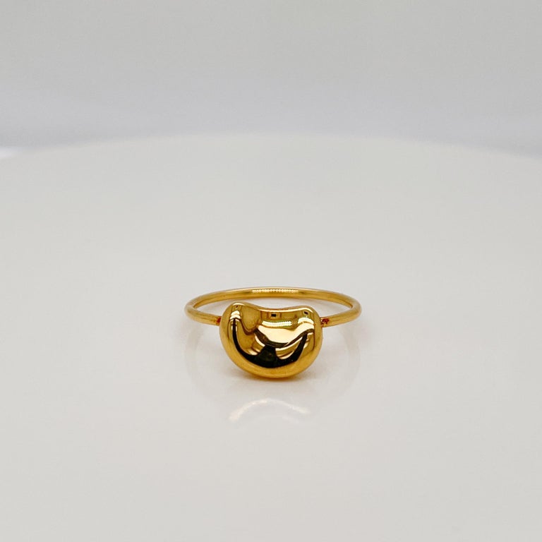 A fine Bean ring designed by Elsa Peretti.

In 18k gold.

By Tiffany & Co.

Simply a great ring by one of Tiffany's top designers!

Date:
20th Century

Overall Condition:
It is in overall good, as-pictured, used estate condition with some fine &