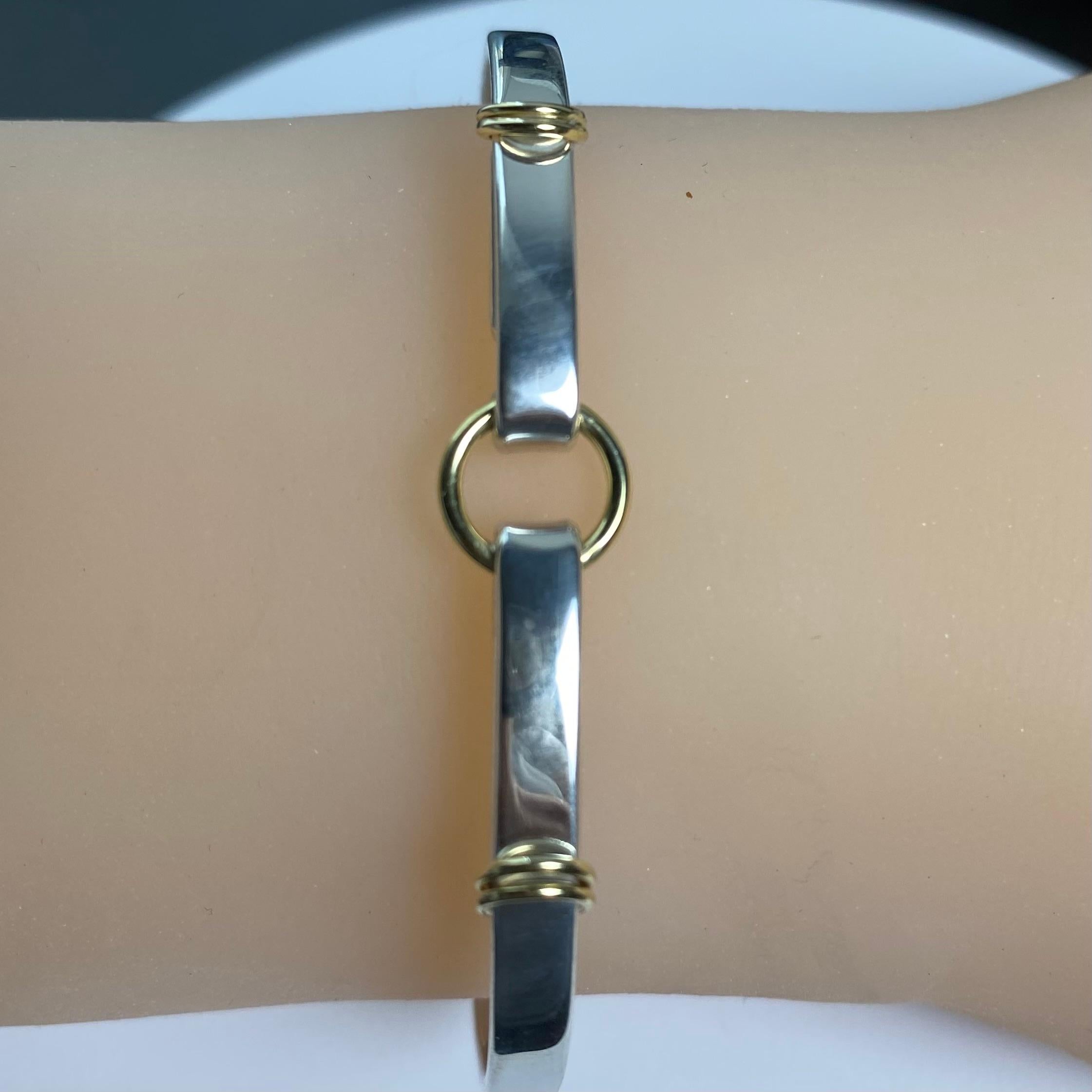Vintage Tiffany Co 18 Karat Yellow Gold and Sterling Silver 2.5 Inch Bangle In Good Condition In New York, NY