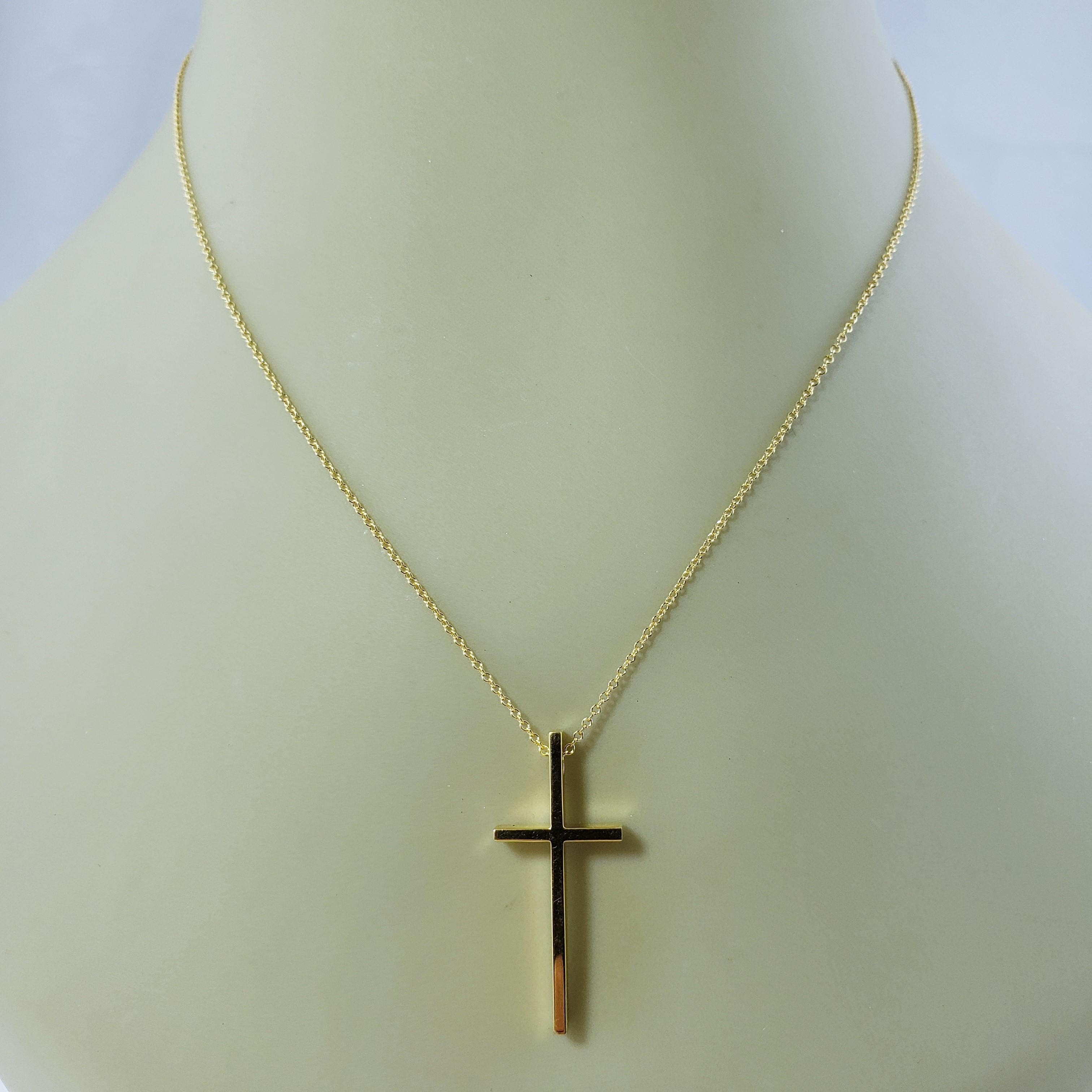 Tiffany and Co. 18 Karat Yellow Gold Cross Pendant at Tiffany and Co. 18 Karat Yellow Gold Cross Pendant at