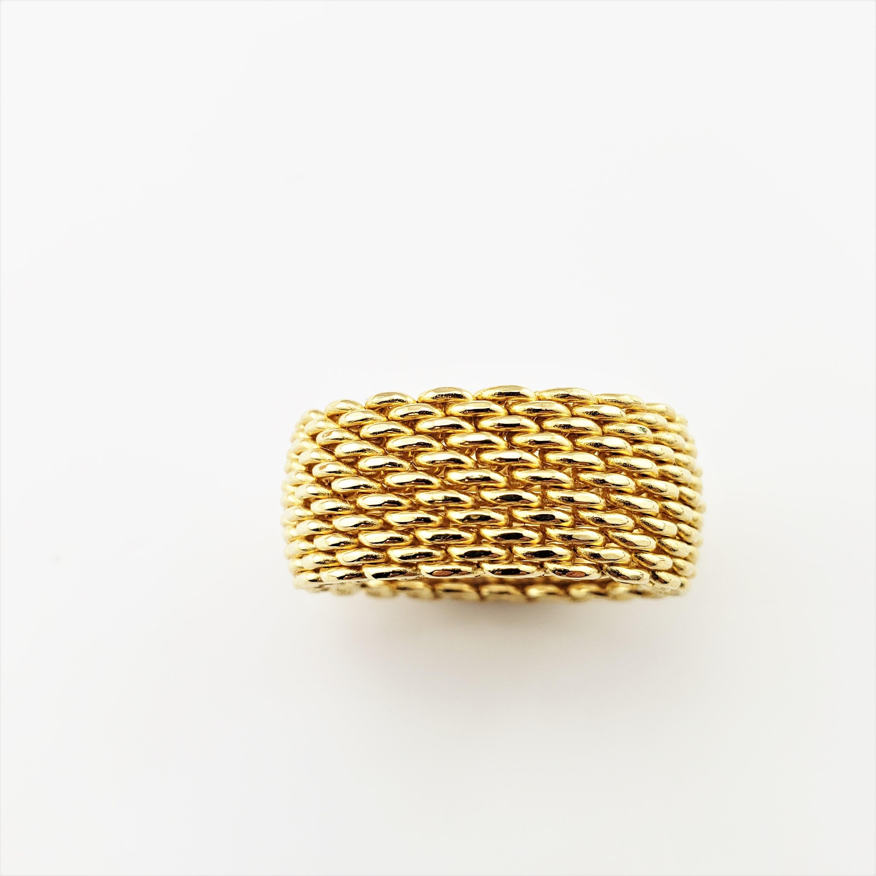 Vintage Tiffany & Co. 18 Karat Yellow Gold Mesh Band Ring Size 6-

This stunning mesh band is crafted in beautifully detailed 18K yellow gold by Tiffany & Co. Width: 10 mm. Original Tiffany & Co. pouch included.

Ring Size: 6

Weight: 8.5 dwt. /