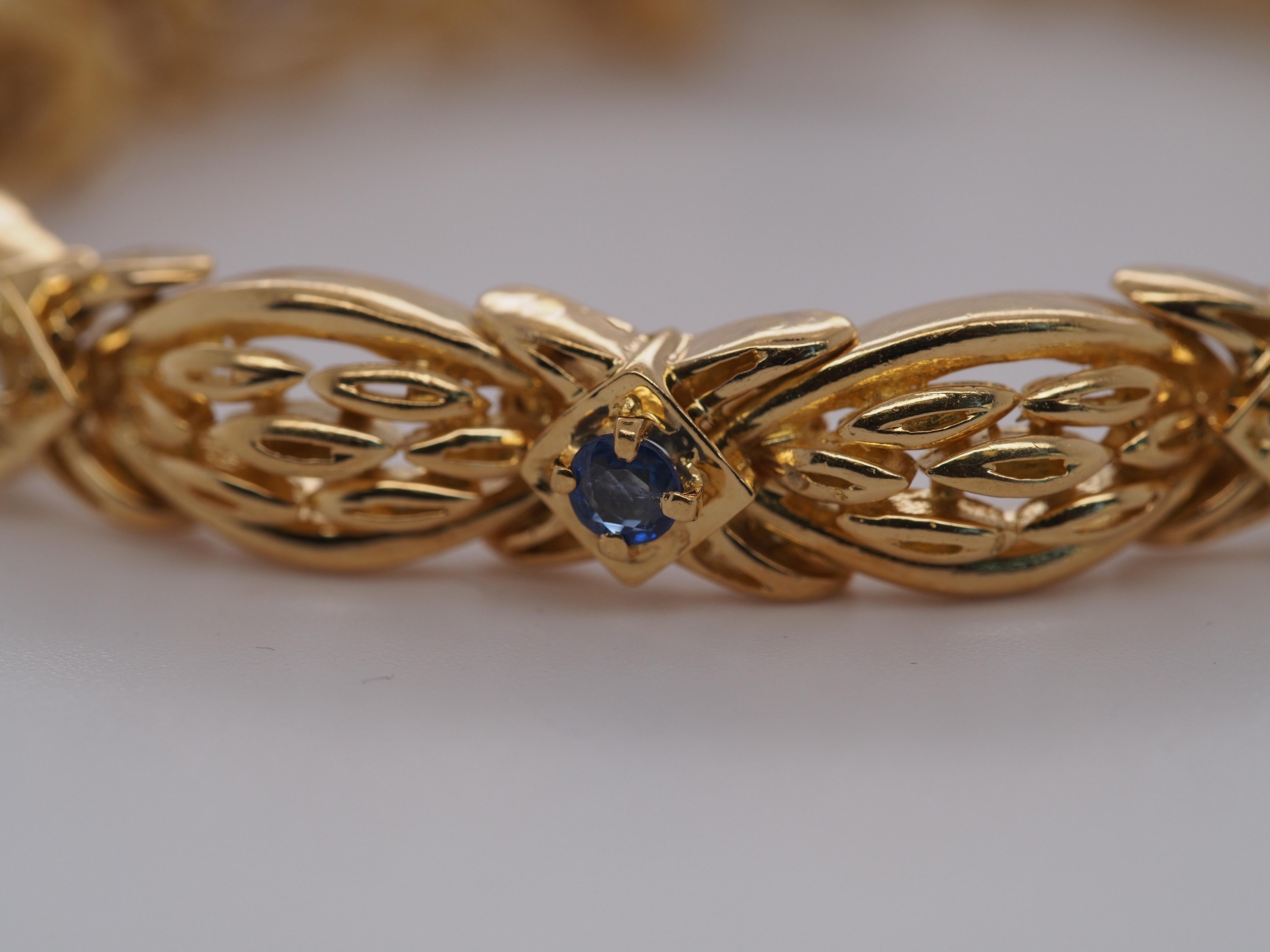 Item Details:
Metal Type: 18K Yellow Gold [Hallmarked, and Tested]
Weight: 36.8 grams (All Items Total)
Diamond Details: .55ct, total weight, F Color, VS Clarity, Round Brilliant Cut
Stone Details:
Weight: .60ct, total weight
Type: Sapphire
Cut:
