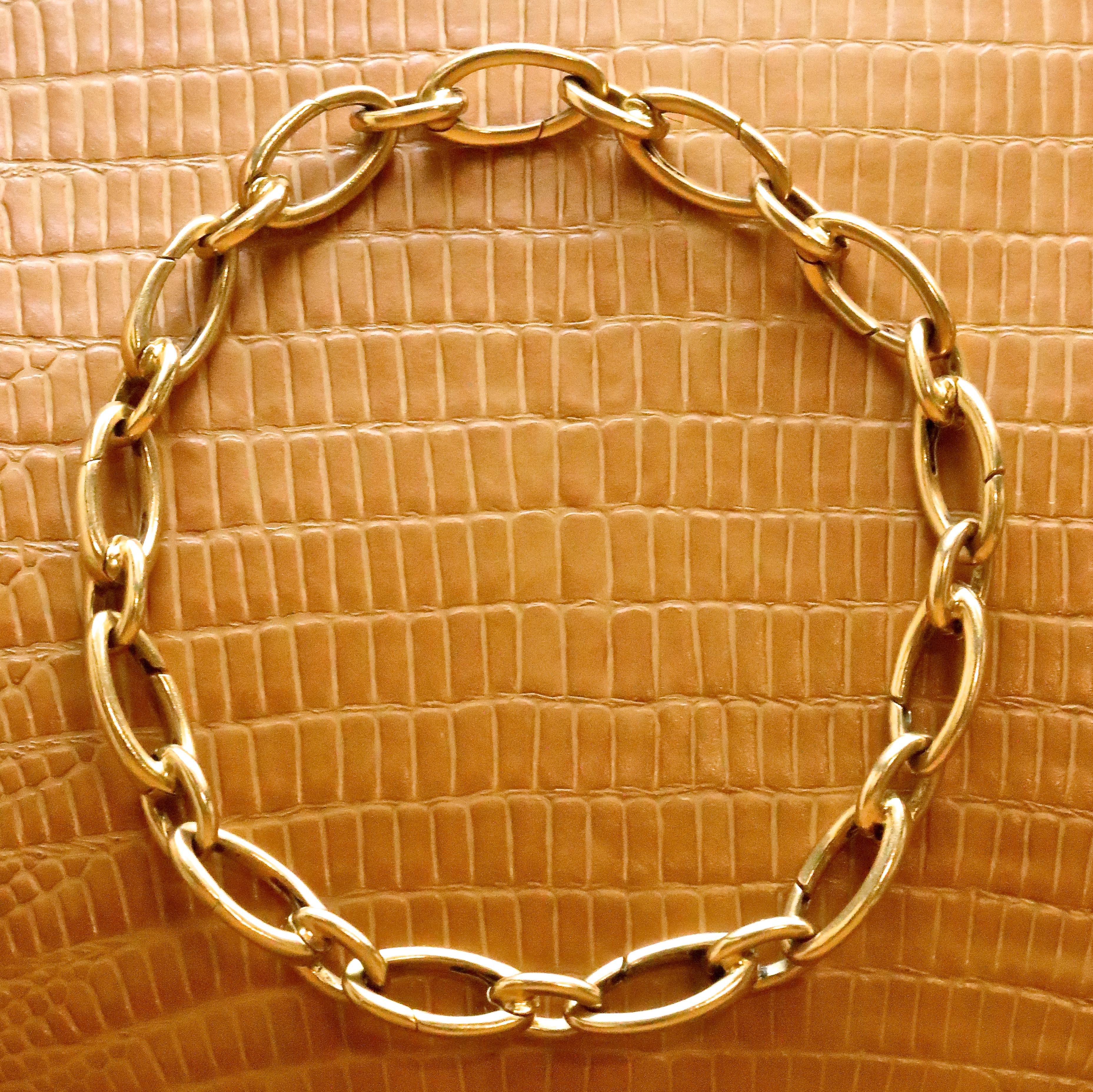 Classic and timeless, this vintage Tiffany & Co. bracelet is a perfect everyday accessory. Wear it with jeans and sweater or a beautiful evening dress; you will not go wrong. Alternating opening elongated oval links. Hallmarked Tiffany & Co, Italy.