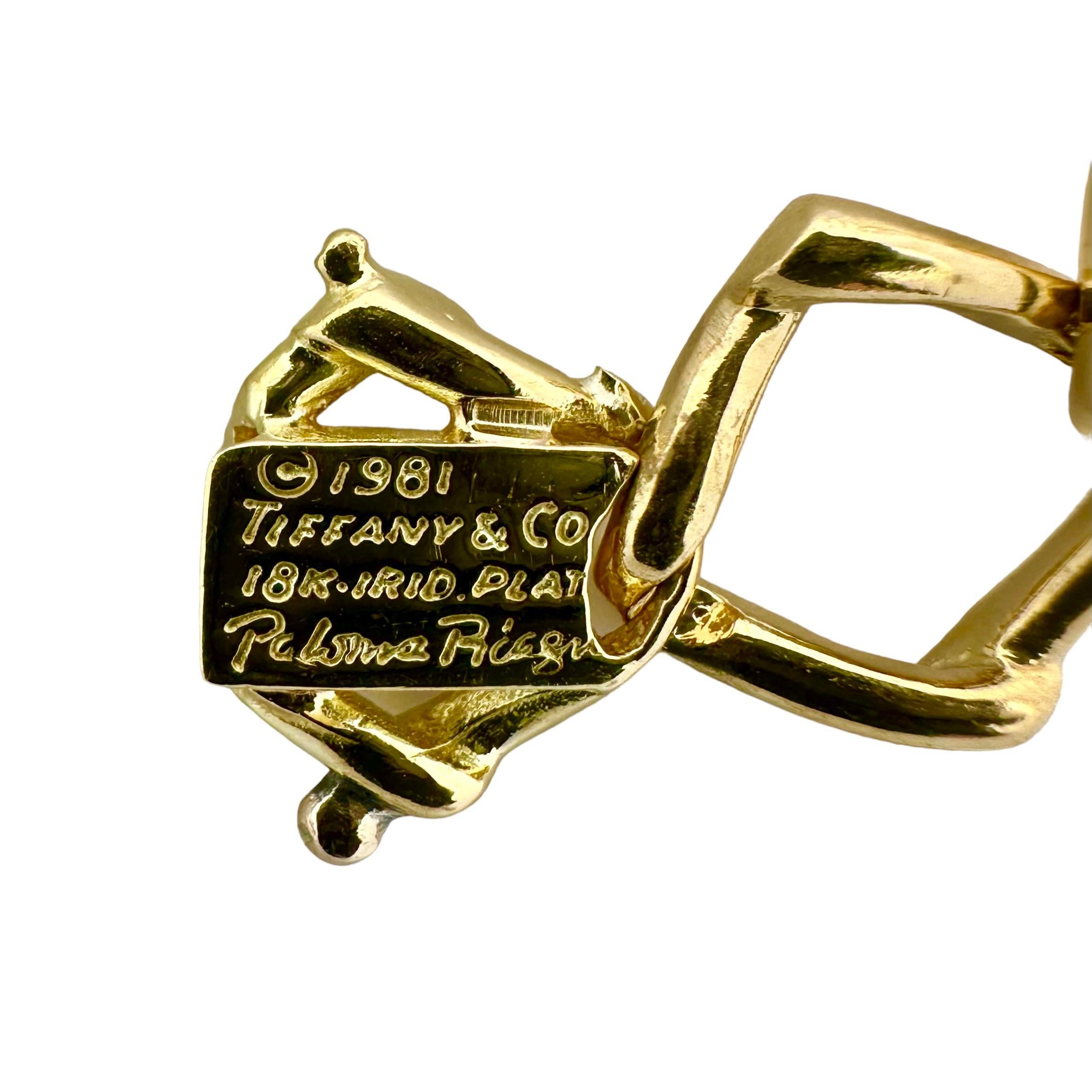 Designed by highly regarded artist, Paloma Picasso, and released by Tiffany & Co. in 1981, this wonderful casual 18k gold and diamond bracelet is a very tasteful item of vintage Tiffany. A total of sixteen yellow gold trapezoidal links have, at
