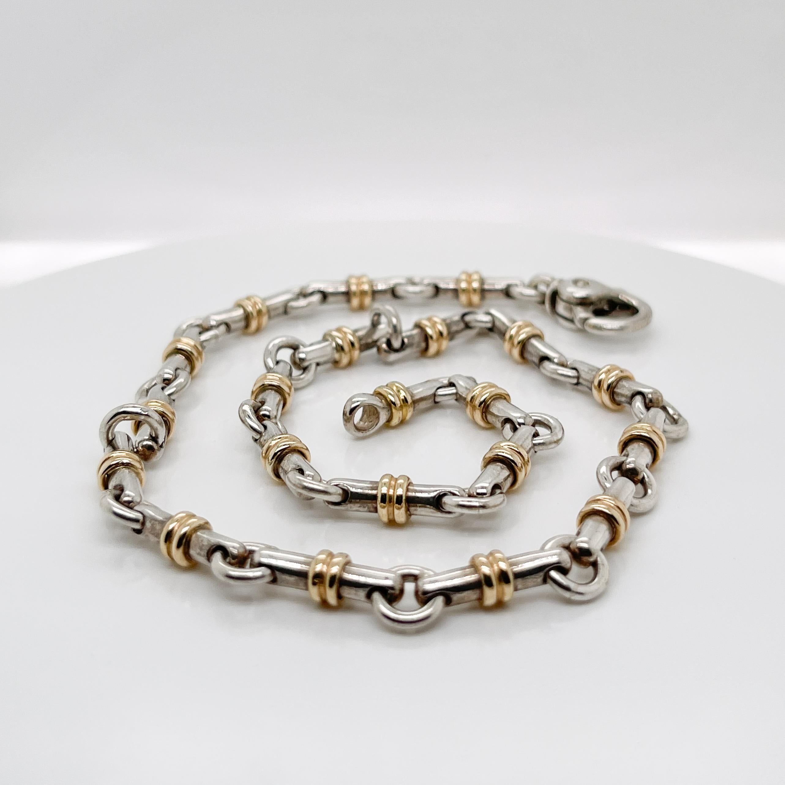 A very fine vintage Tiffany & Co. silver and gold bar link necklace.

With mixed metal 18k gold and sterling silver bar links that are joined by silver jump rings.

Simply great Tiffany design!

Date:
20th Century

Overall Condition:
It is in