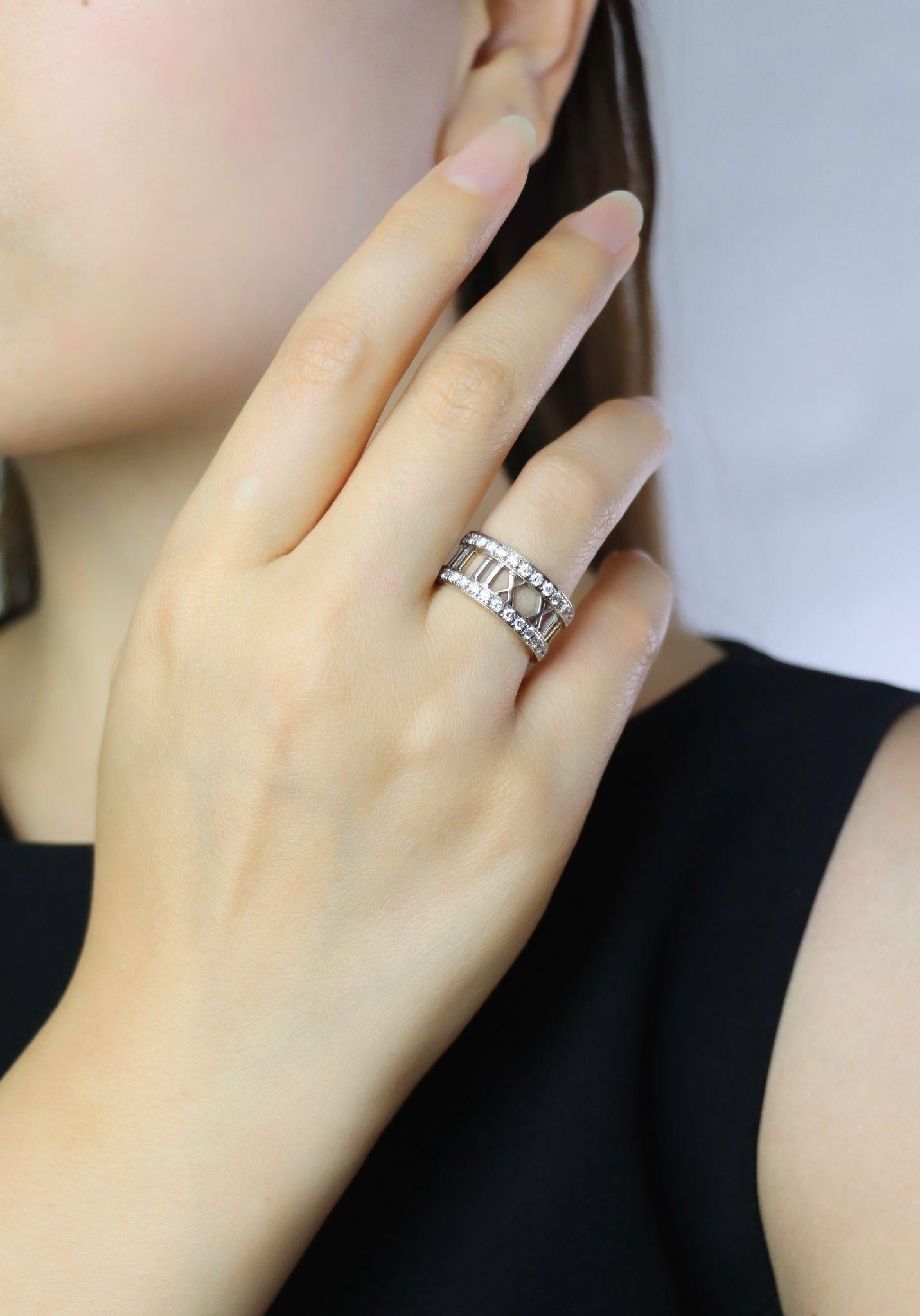 Vintage Tiffany & Co 18K White Gold Diamonds Open Atlas Ring

Marked:
Tiffany & Co
ATLAS
@2003
Italy
750

Approximate Dimensions:
6.25 (Ring Size)
0.9 cm (Width)
Approx. 0.75 carat (Diamond)
6.7 grams in weight.

** All dimensions listed above are