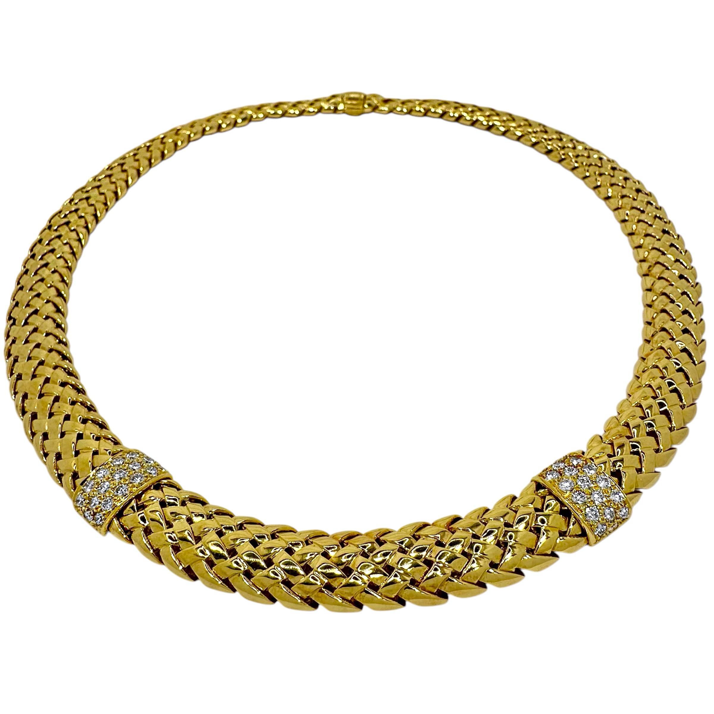 This woven, 18K yellow gold Tiffany & Co. Vannerie necklace with two diamond stations was released by the venerated house in 1995. It is smart and tailored, and is ideal for daytime to evening wear. Two diamond stations set with a total of thirty
