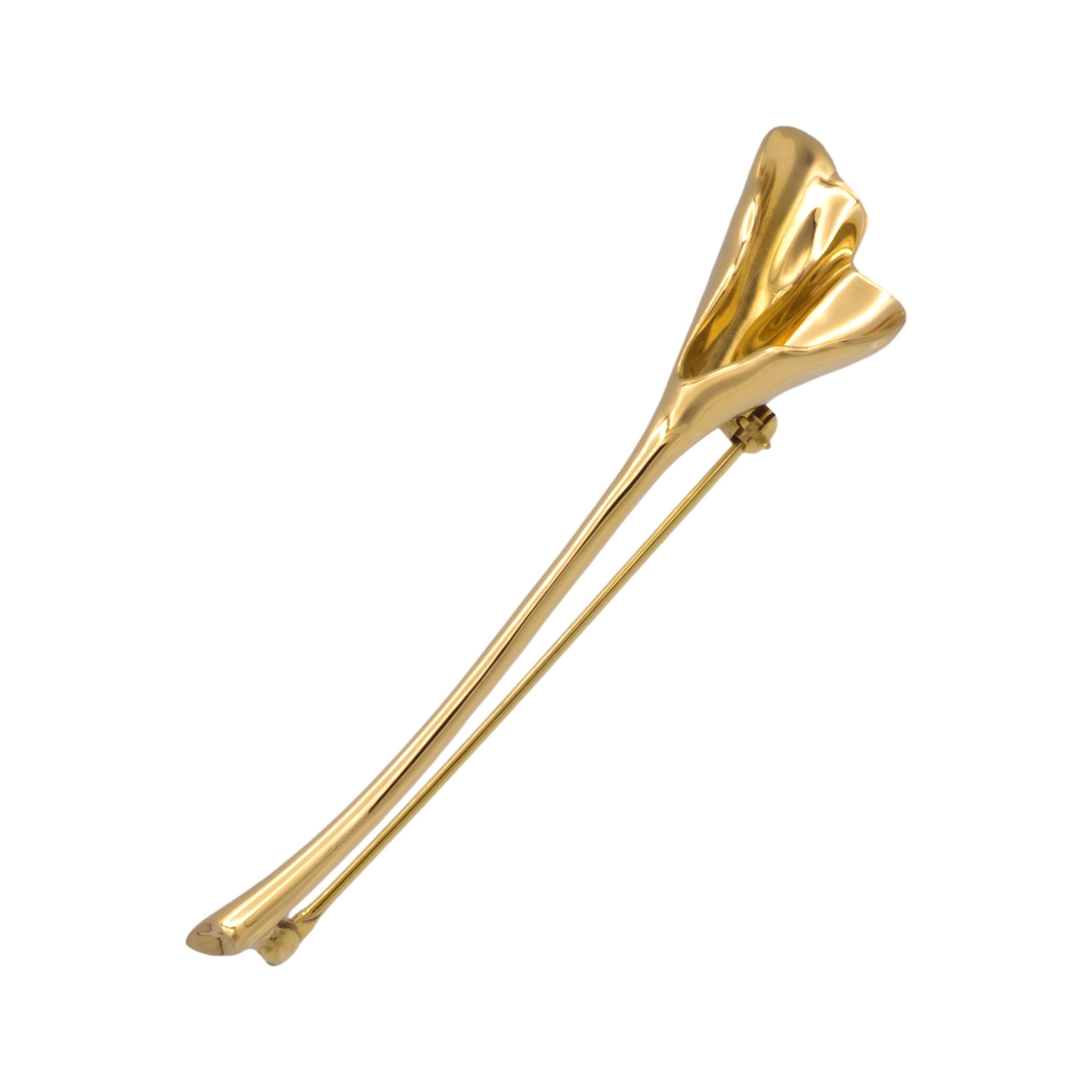 Vintage Tiffany & Co. Cala Lily flower brooch finely crafted in 18 karat yellow gold . This brooch has a stick pin closure and was manufactured in the year 1960. Fully hallmarked with logo and metal content.  

Brooch Specifications
Brand: Tiffany &