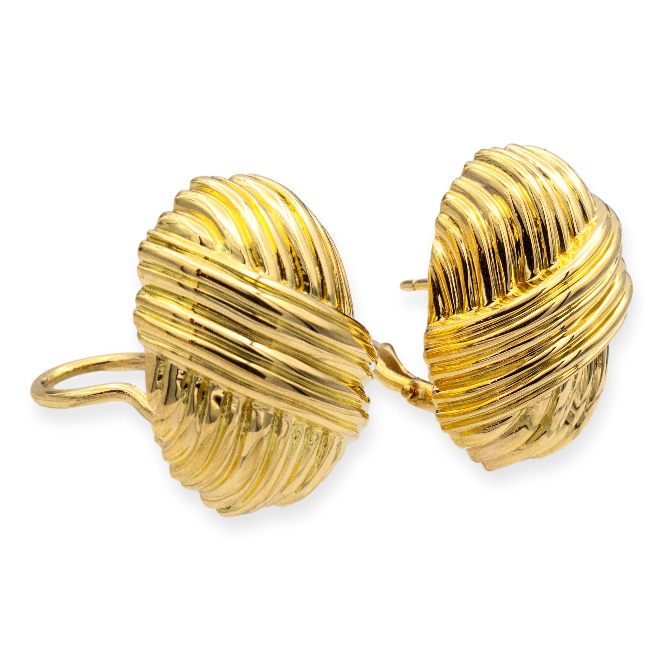 Tiffany & Co. vintage clip-on earrings with posts from the 1980's finely crafted in 18 karat yellow gold with large omega backs. 
Fully hallmarked with logo and metal content.

Earrings Specifications
Brand: Tiffany & Co.
Style: Vintage 1980's Clip-
