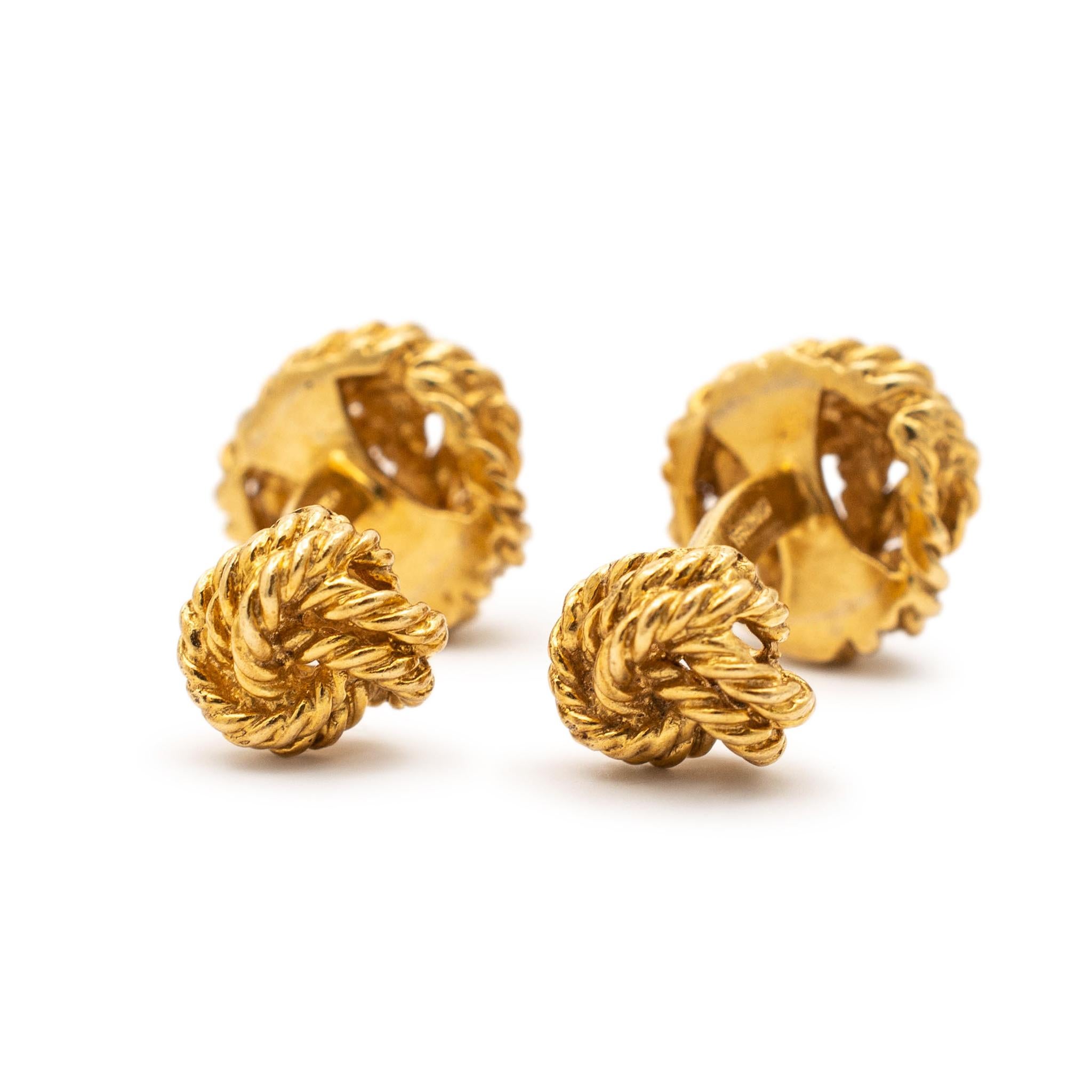 Brand: Tiffany & Co.

Material: 18K Yellow Gold

Length: 1.00 inches

Diameter: 14.20 mm

Weight: 14.40 grams

One pair 18K yellow gold knotted cufflinks. Engraved with 