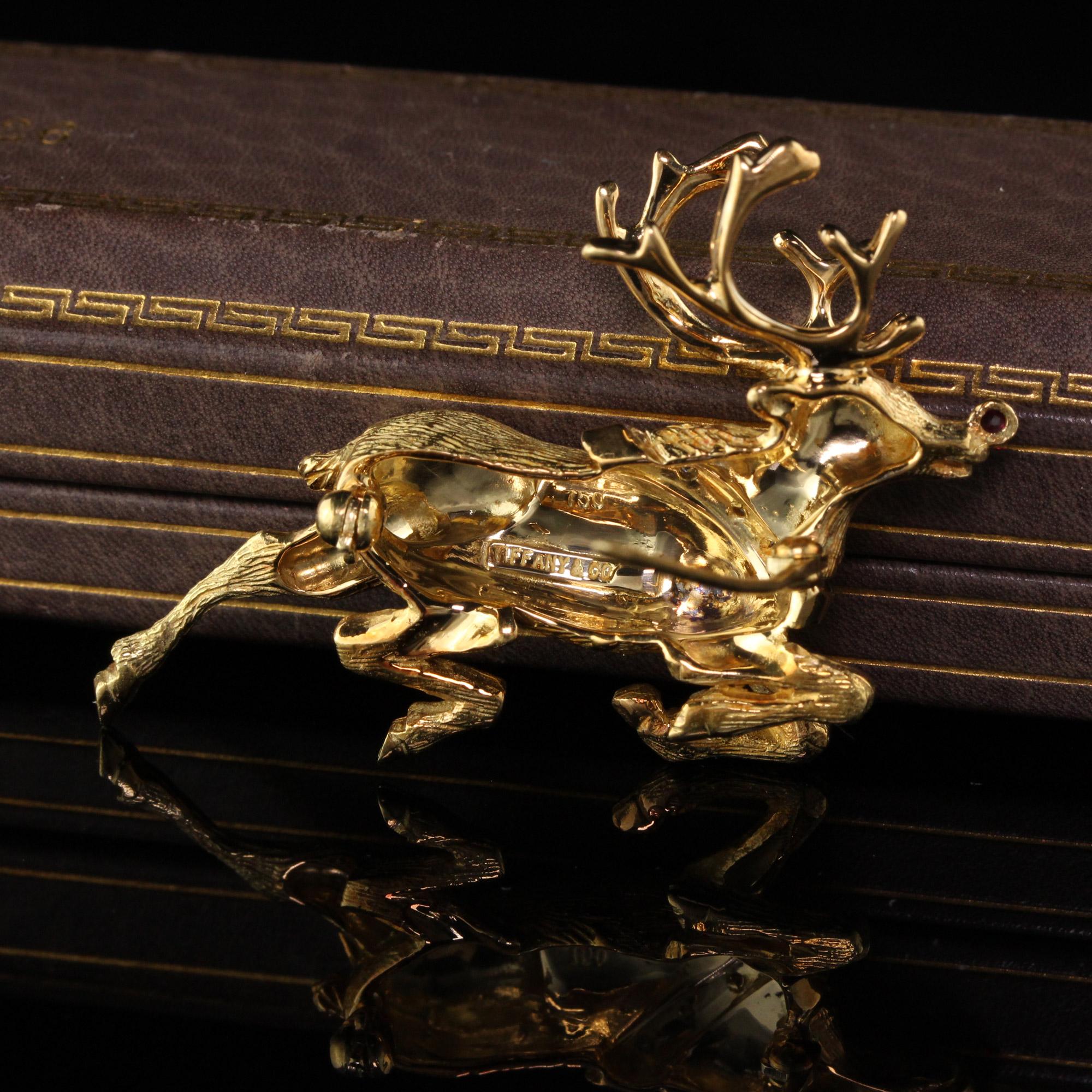 gold reindeer brooch
