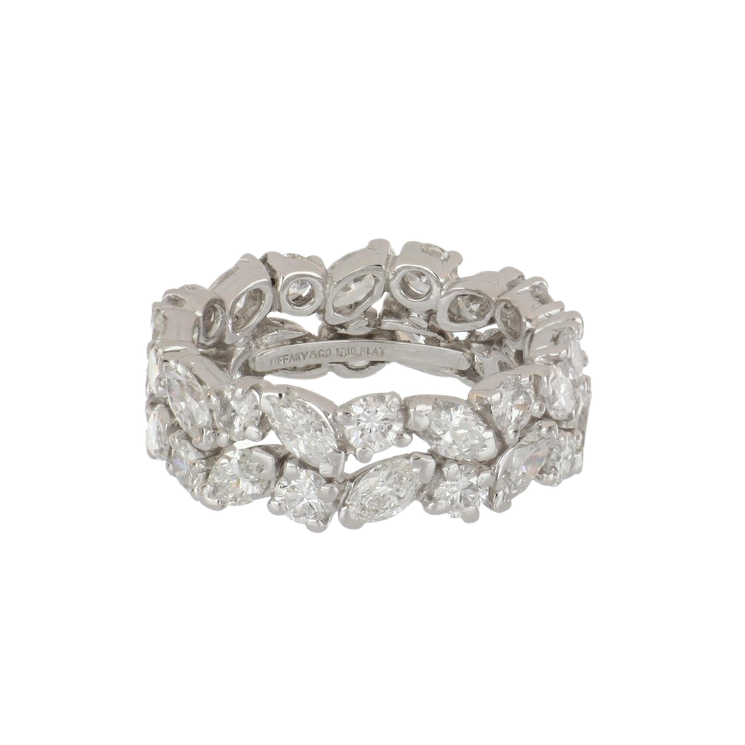 Vintage Tiffany & Co. diamond eternity band, featuring a double row of marquise and round brilliant-cut diamonds in an alternating pattern, set in platinum. There are 18 round brilliant-cut diamonds totaling 1.65 carats, E-F in color, VVS1-VS1 in