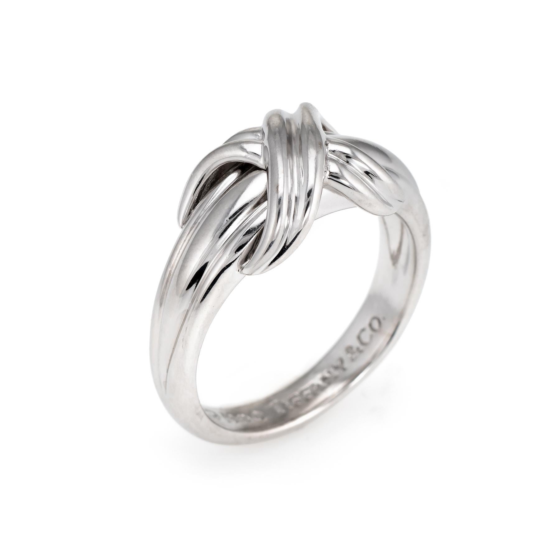 Finely detailed vintage Tiffany & Co knot band, crafted in 18 karat white gold. 

The knot design by Tiffany & Co is a symbol of continuous connection, energy and vitality.    

The ring is in excellent condition and was recently professionally