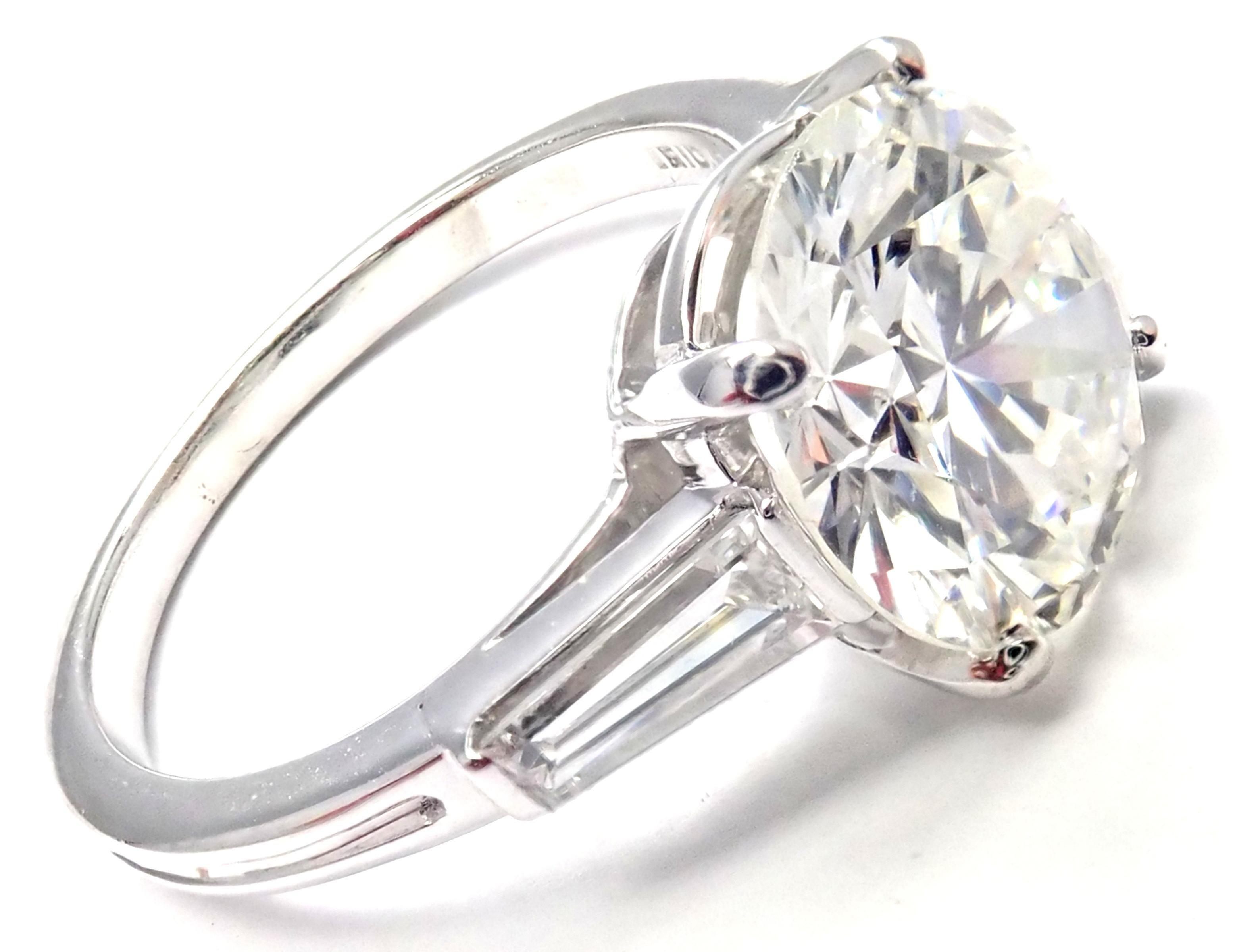 Platinum Diamond Engagement Ring by Tiffany & Co. 
With 1 round brilliant cut diamond in the center G color, VS1 clarity weight 2.488ct
2 baguette diamonds VS1 clarity, G color total weight approx. .30ct
This ring comes with diamond report from