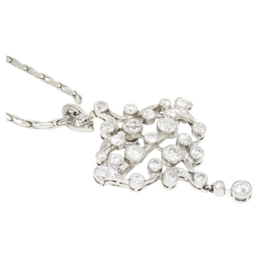 Elevate your style with this exquisite Tiffany & Co. pendant necklace. Featuring a total of 3 carats of diamonds, predominantly in the E-F color and VS clarity range, this piece exudes brilliance and sophistication. The pendant, tested platinum and