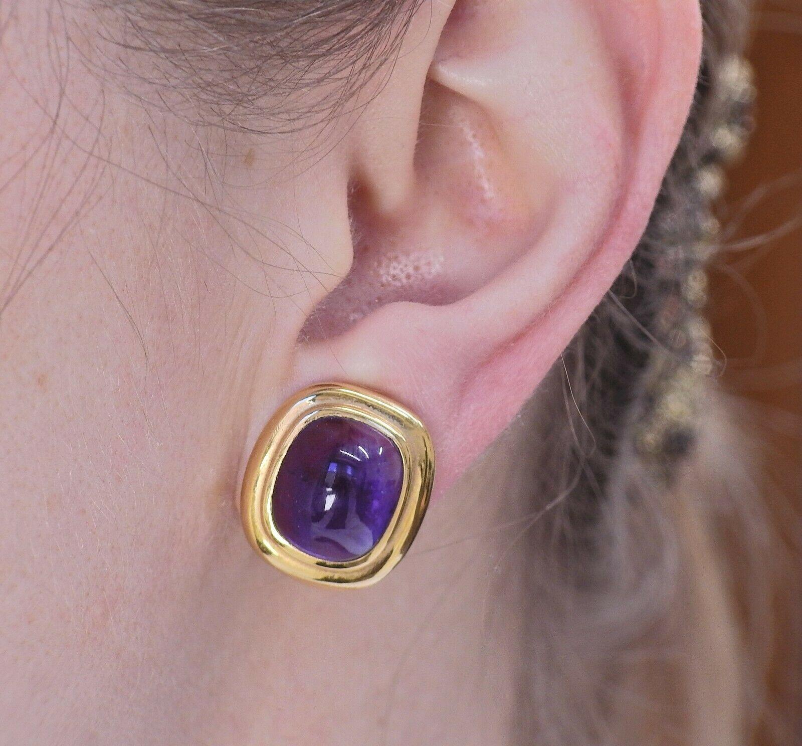 Pair of vintage 8k gold earrings by Tiffany & Co , with amethyst cabochons 12.4 x 10.8mm. Earrings are 18mm x 17mm. Weight - 11.7 grams. Marked: Tiffany & Co, 750. 