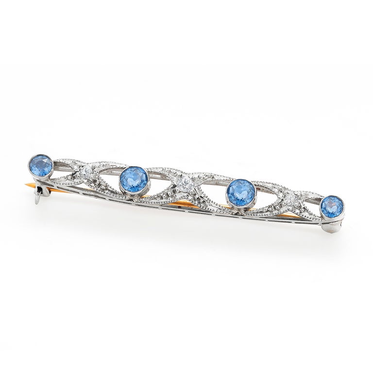 Vintage Tiffany and Co Art Deco Diamond and Sapphire Platinum on Gold Brooch In Good Condition For Sale In New York, NY