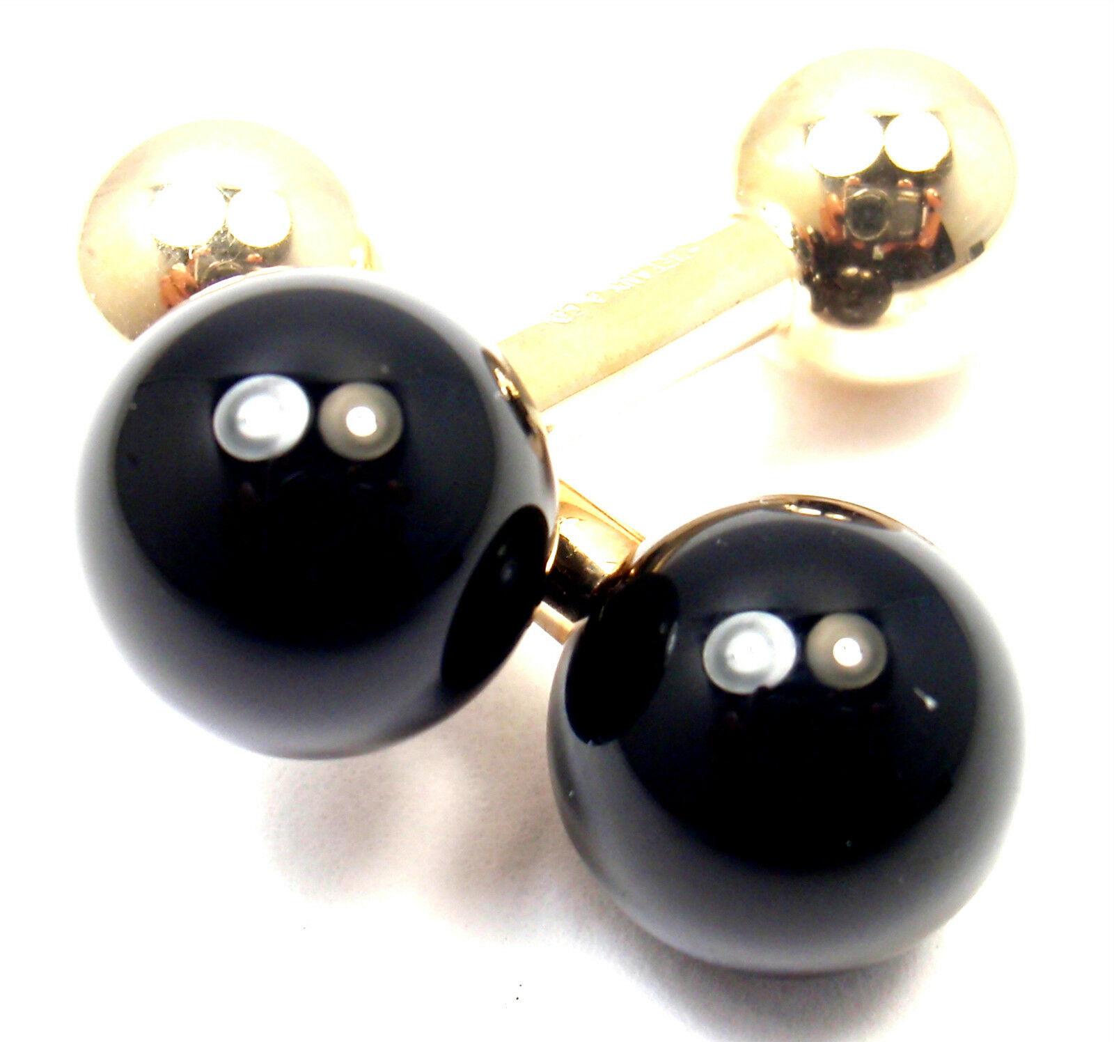 14k Yellow Gold Black Onyx  Dumbbell Cufflinks by Tiffany Co. 
With 2 round black onyx stones 11mm each
Details: 
Measurements: 11mm x 10mm x 30mm
Weight: 7.5 grams
Stamped Hallmarks:  Tiffany & Co. 585
*Free Shipping within the United States*
YOUR