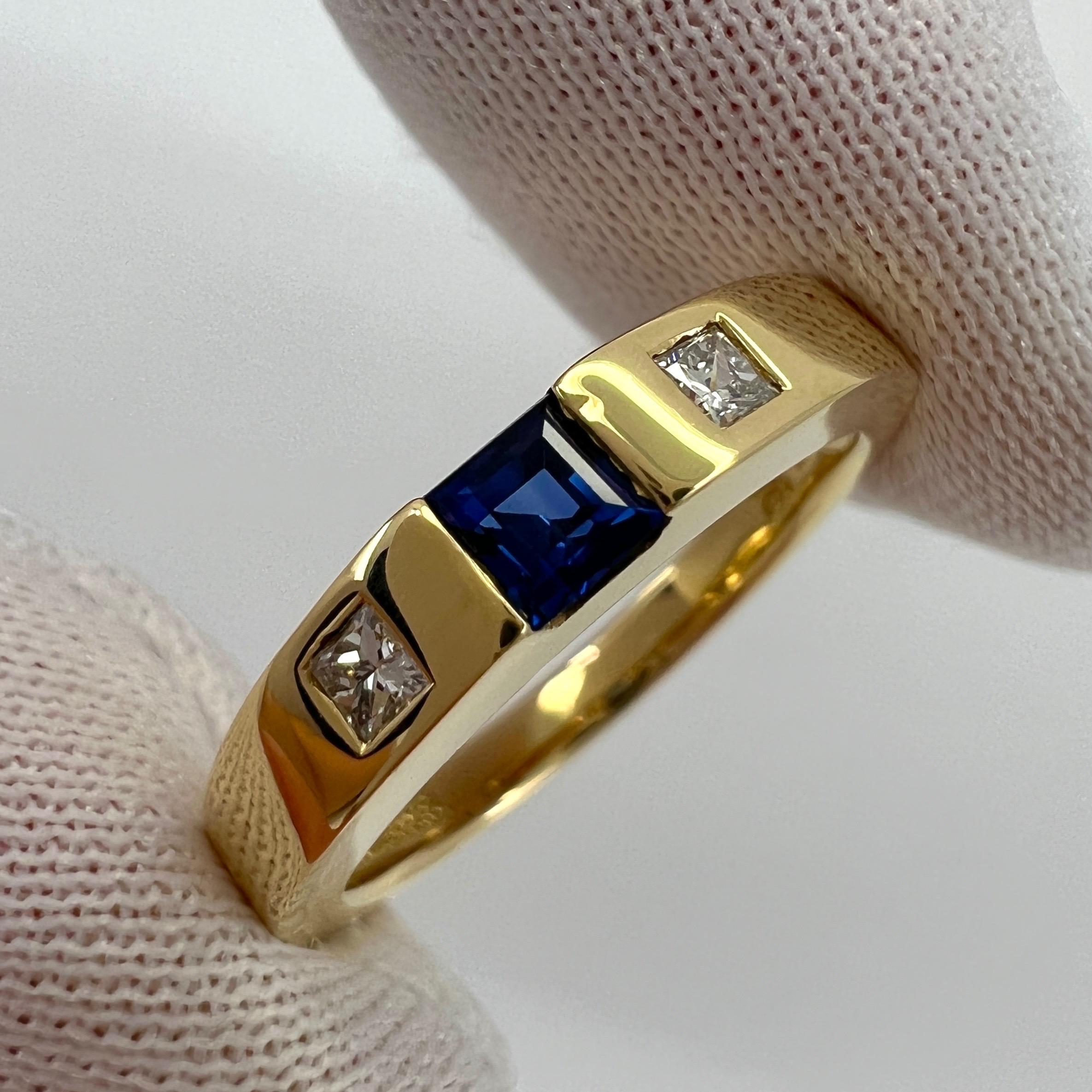 Vintage Tiffany & Co Blue Sapphire & Diamond 18k Yellow Gold Three Stone Band Ring.

Stunning yellow gold ring set with a fine princess cut deep blue sapphire (3.4mm) and 2 princess cut diamonds (2mm).

Fine jewellery houses like Tiffany only use