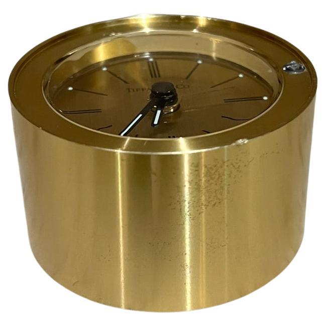 AMBIANIC presents
Vintage Tiffany & Co Brass Round Desk Clock
1.38 h x 2.38. New battery, tested and working. 
Original preowned vintage condition
Refer to all images