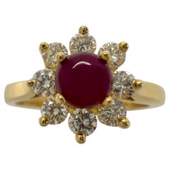 Tiffany & Co. d'epoca. Anello a fiore con rubino rotondo cabochon e diamante in oro 18 ct.