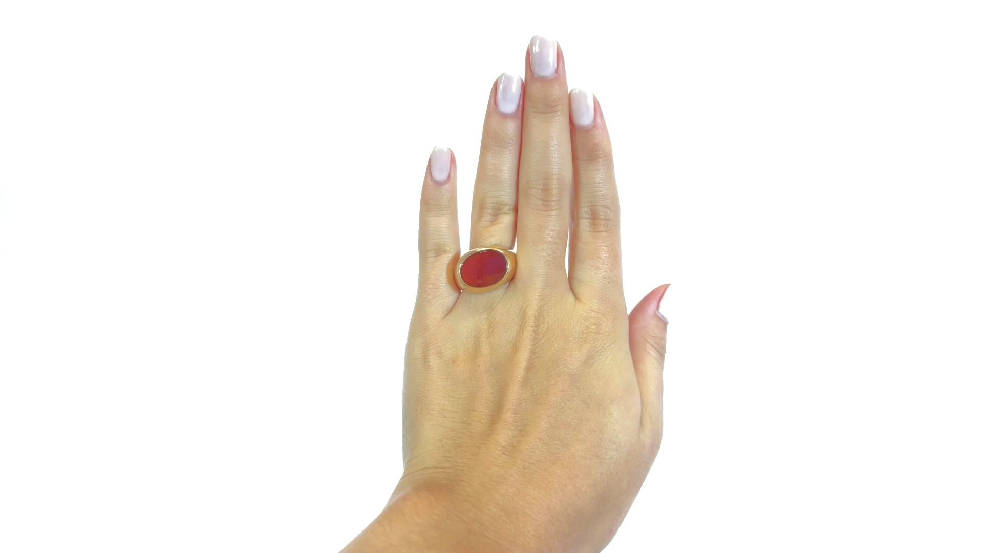 You can convey your power and strong character with this solid gold carnelian signet ring. This vintage Tiffany & Co. ring would be perfect for any gender; perfectly smooth and pleasant to touch featuring a polished carnelian. Signed Tiffany & Co.