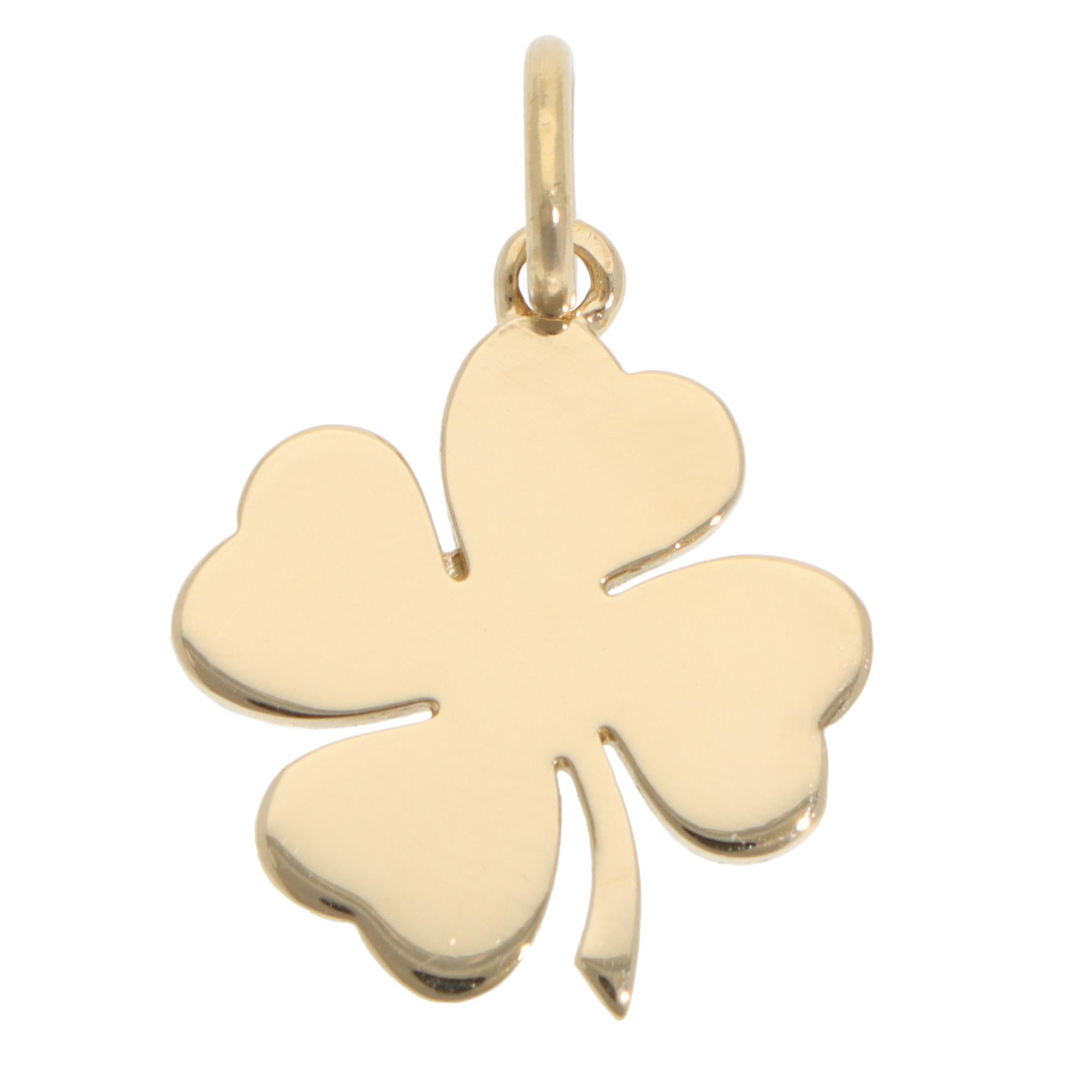 A beautiful vintage Tiffany & Co. clover pendant set in 18k yellow gold.

The pendant solely features a clover motif. It is simple and timeless. The clover securely connects to a polished bail, which can easily be hung on a chain necklace or used as