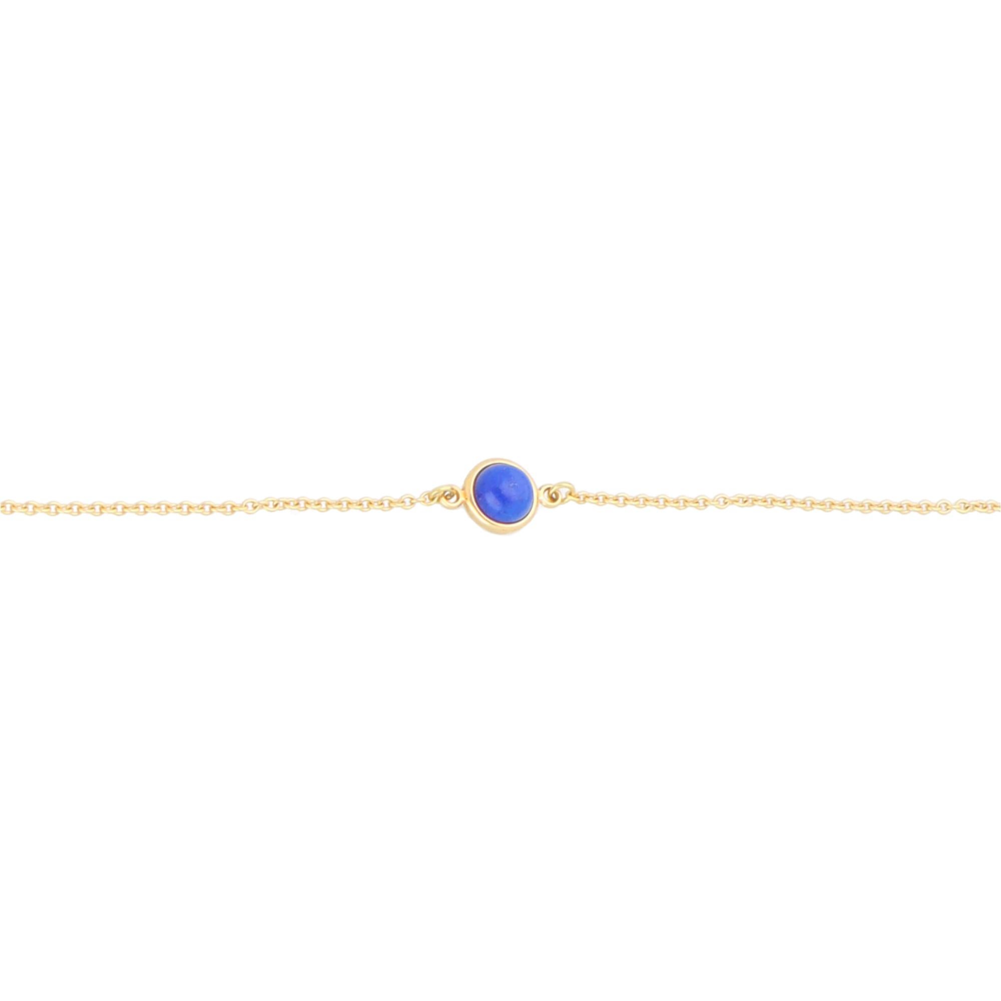 A simple vintage Elsa Peretti for Tiffany & Co. Colour by the Yard lapis lazuli chain bracelet set in 18k yellow gold.

The bracelet is composed of a central lapis lazuli with bezel setting. It is connected by a fine yellow-gold trace chain and,