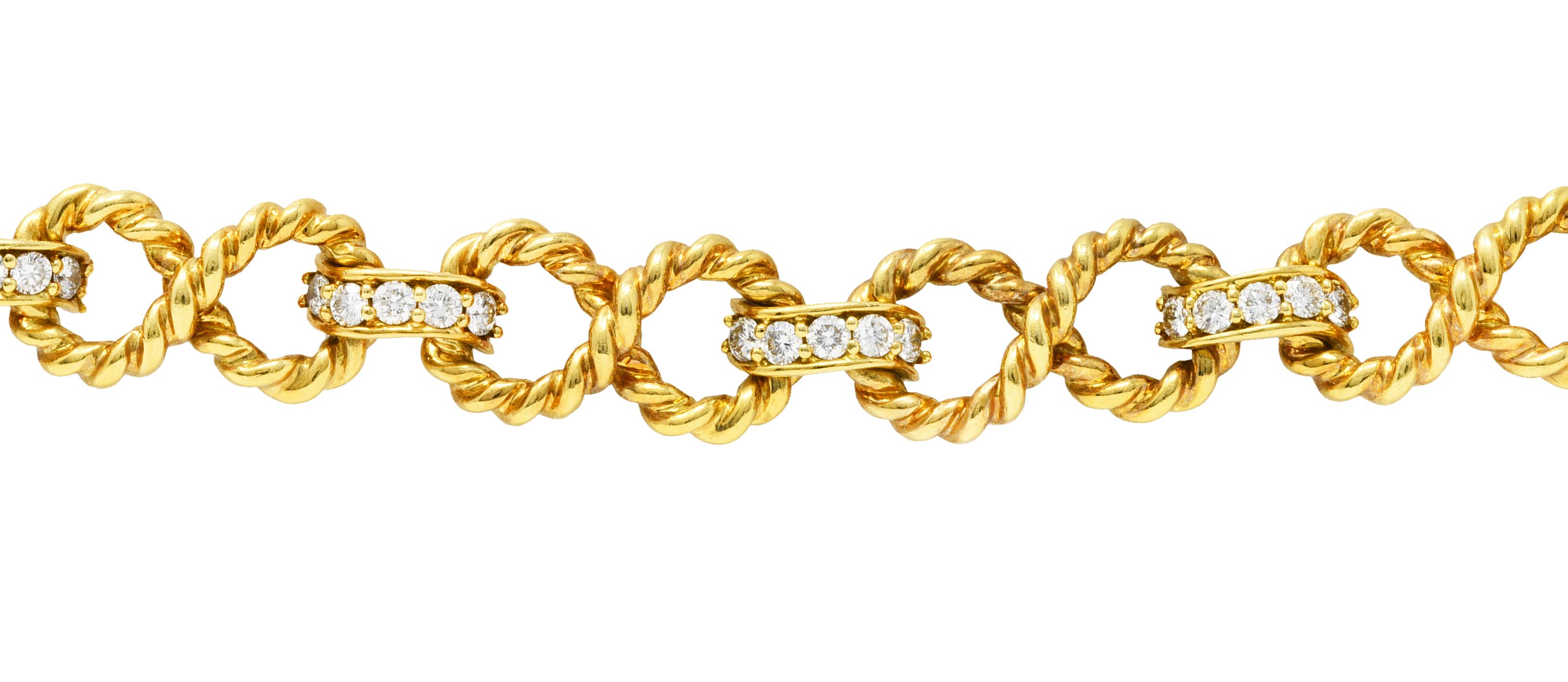 Vintage Tiffany & Co. Diamond 18 Karat Gold Twisting Infinity Bracelet In Excellent Condition In Philadelphia, PA