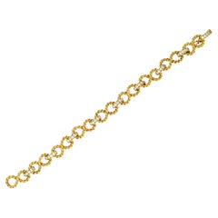 Vintage Tiffany & Co. Diamond 18 Karat Gold Twisting Infinity Bracelet