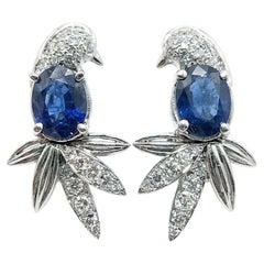 Vintage Tiffany
Co. Diamond and Sapphire Parrot Clip-On Earrings in 18K Vintage Tiffany
Co. Diamond and Sapphire Parrot Clip-On Earrings in 18K