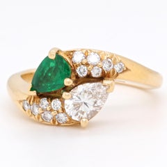 Vintage Tiffany & Co. Diamond Emerald 18 Karat Bypass Toi et Moi Ring