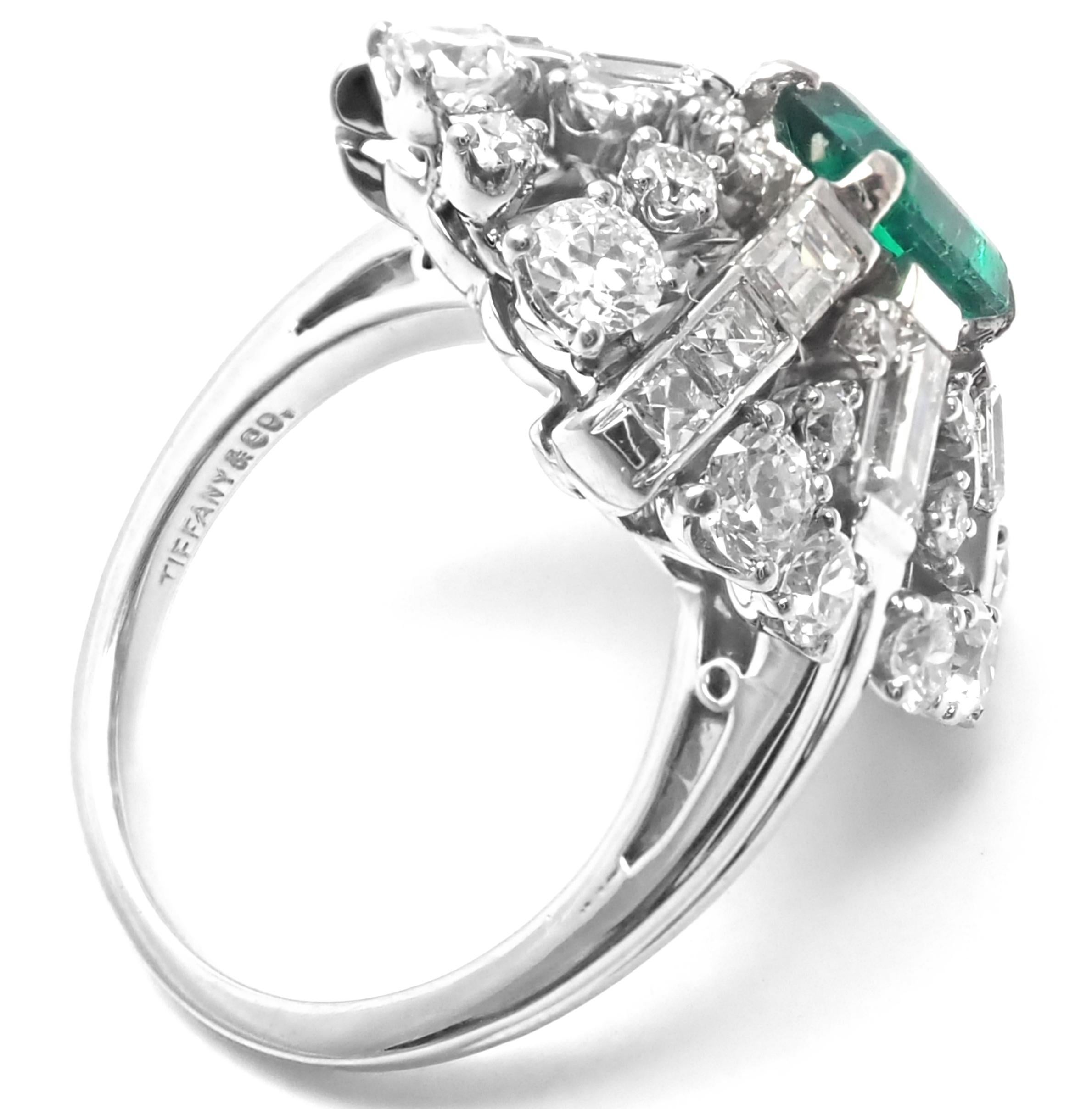 Irid Platinum Emerald Diamond Vintage Ring by Tiffany & Co. 
With 30 round old European cut VVS1 clarity, E color diamonds
10 French cut diamonds plus 6 emerald cut diamonds 
total weight of all diamonds approximately 1.80ct
1 emerald cut Columbian