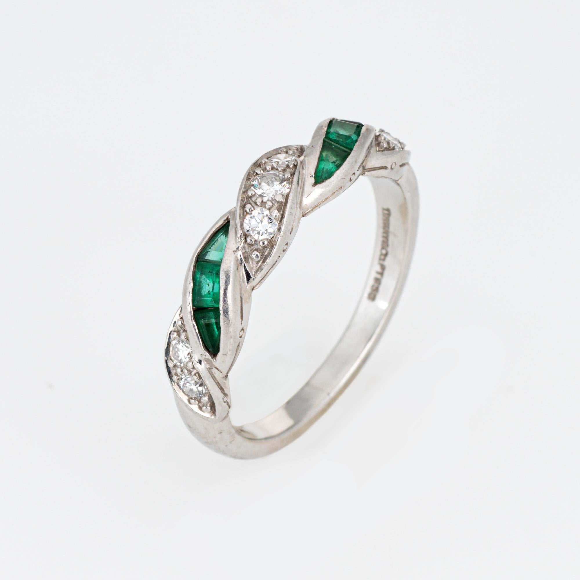 Vintage Tiffany & Co diamond & emerald ring crafted in 950 platinum.  

7 diamonds total an estimated 0.08 carats (estimated at G-H color and VS1-2 clarity). The emeralds measure from 1.5mm to 2mm (the emeralds are in good condition and free of