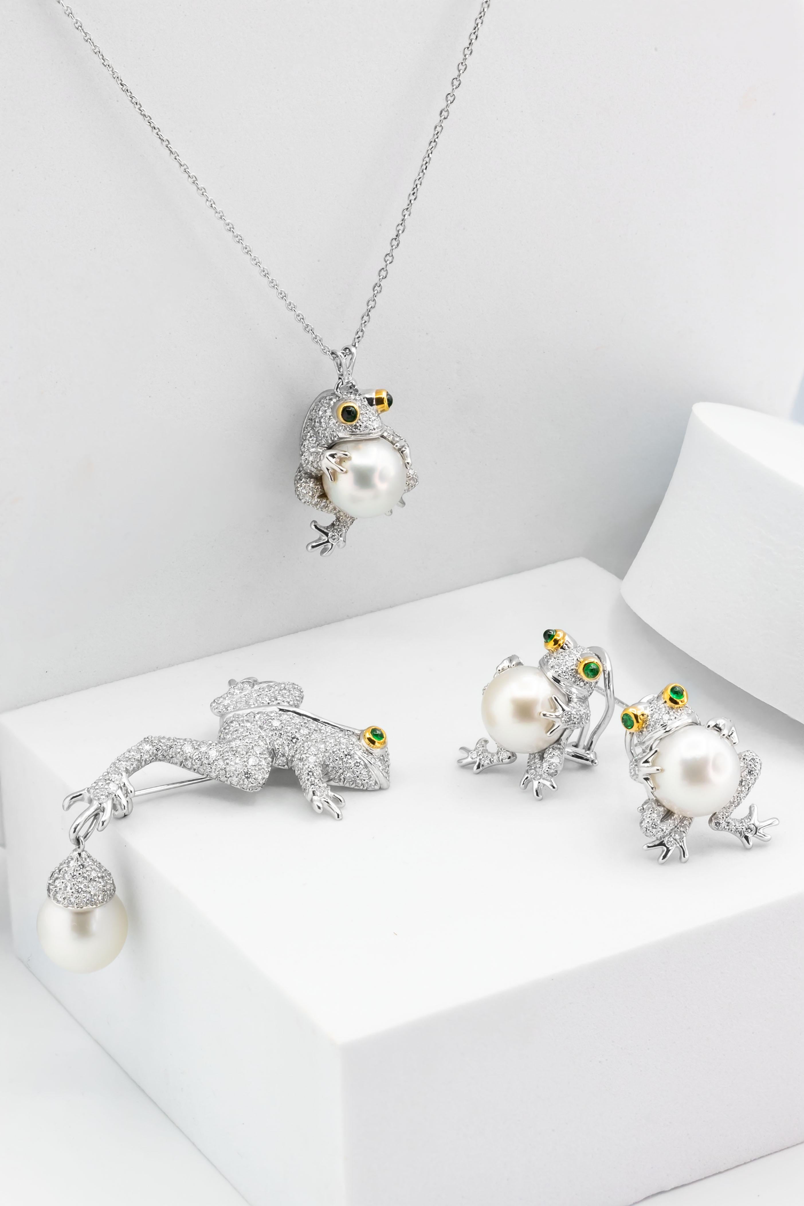 Beautiful and Whimsical Frog Set; each set with a South Sea Pearl enhanced with Diamond body and Emerald eyes. 
Late 20th century. Comes in black suede Tiffany & Co. case, Signed Tiffany & Co.

NECKLACE
Designed as a stylized frog pendant set with