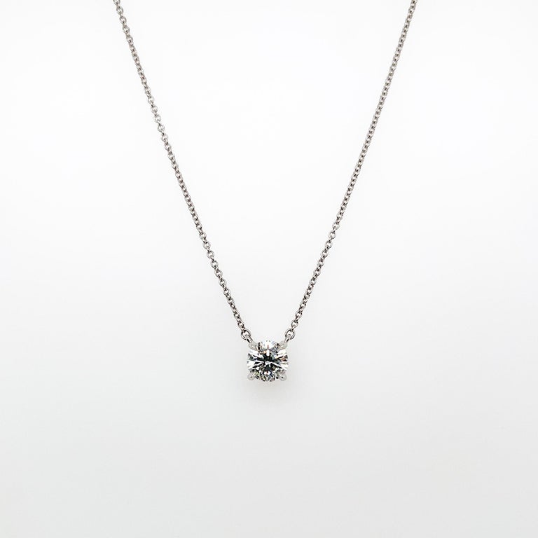 Modern Vintage Tiffany & Co. Diamond & Platinum Solitaire Pendant Necklace For Sale