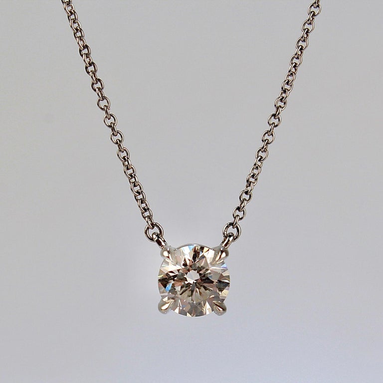 Round Cut Vintage Tiffany & Co. Diamond & Platinum Solitaire Pendant Necklace For Sale