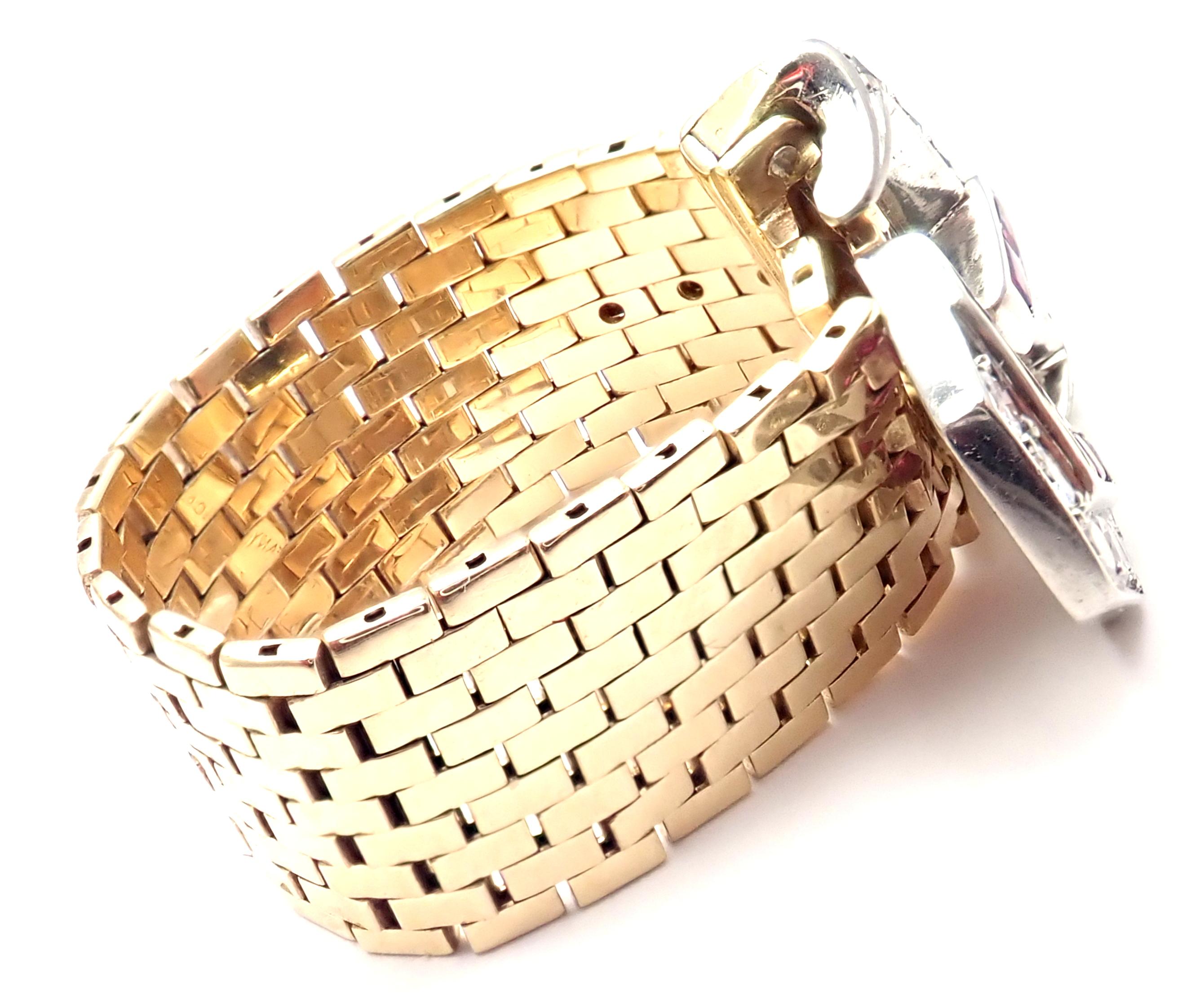 Yellow Gold & Platinum Diamond Ruby Buckle Vintage Band Ring by Tiffany & Co. 
With 17 round shape diamonds and 6 marque cut diamonds VS1 clarity G color total weight approx. 1/2ct
8 Round rubies total weight approximately 1/2ct
Details: 
Weight: