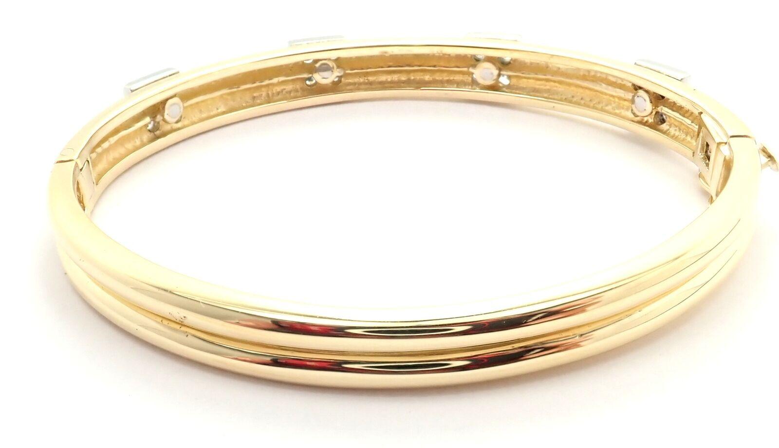 Vintage Tiffany & Co. 18k Yellow Gold Diamond Bangle Bracelet. 
With 16 brilliant round cut diamond VS1 clarity, E color total weight approximately 1.12ct
Details:
Length: 6.5
