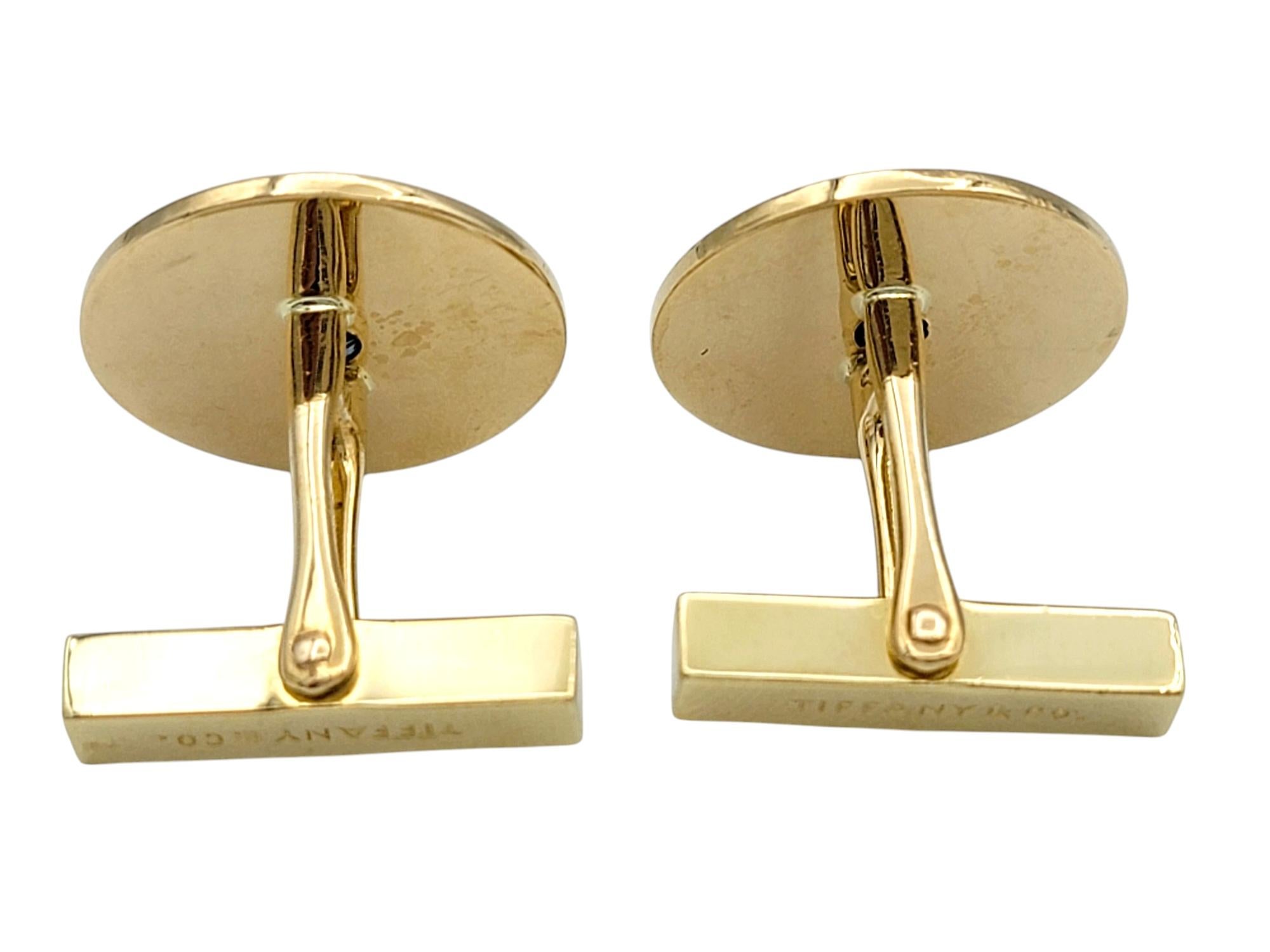 Contemporary Vintage Tiffany & Co. Disc Style 14 Karat Yellow Gold Cufflinks with Sapphires For Sale
