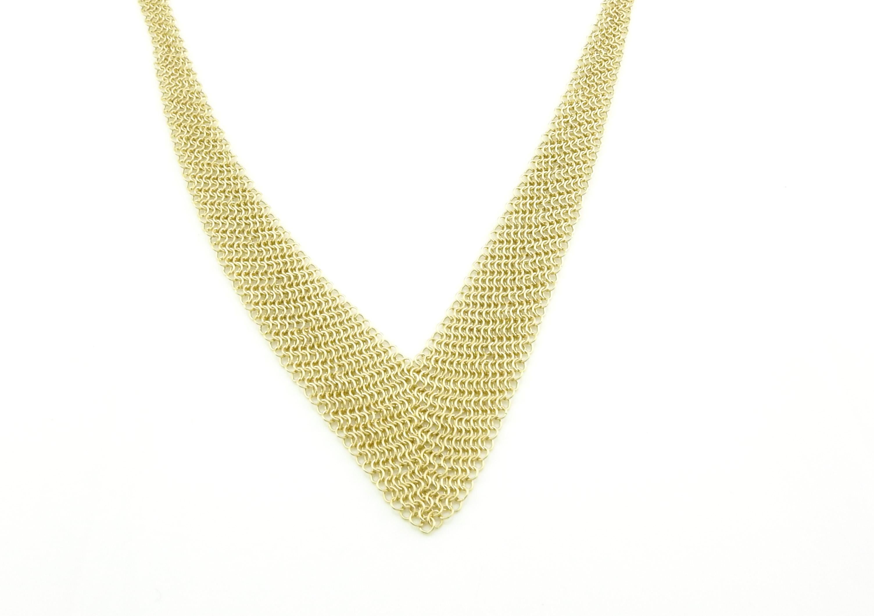 Vintage Tiffany & Co. Elsa Peretti 18K Yellow Gold Mesh Bib Tie Necklace

This authentic Tiffany necklace is from circa 2000

On Tiffany presently for $9,600

This mesh necklace is approx. 26