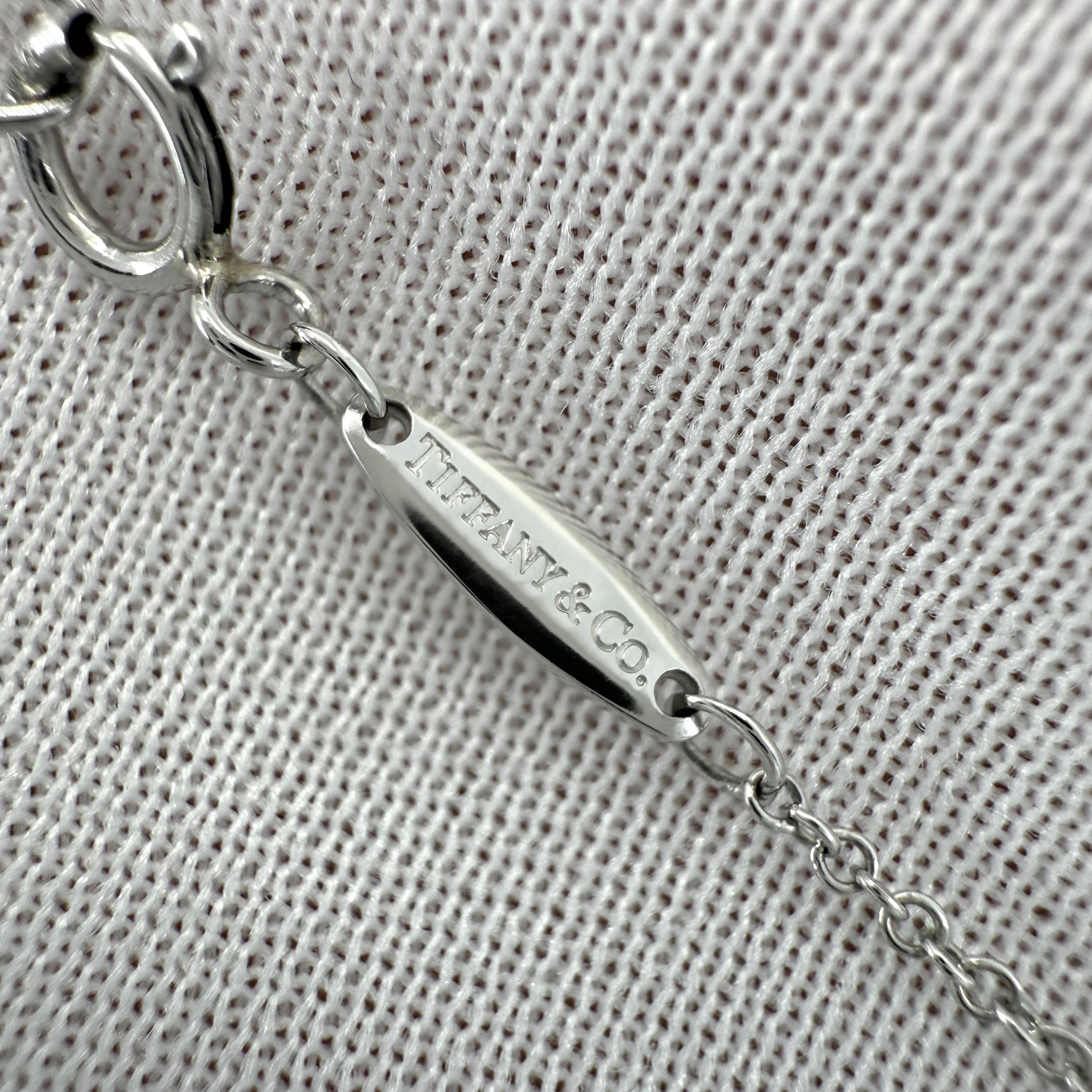 Donna Tiffany & Co. d'epoca. Collana con ciondolo in platino con diamanti di Elsa Peretti in vendita