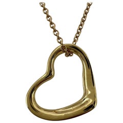 Vintage Tiffany
Co. Elsa Peretti Open Heart 18k Gold Pendant Necklace