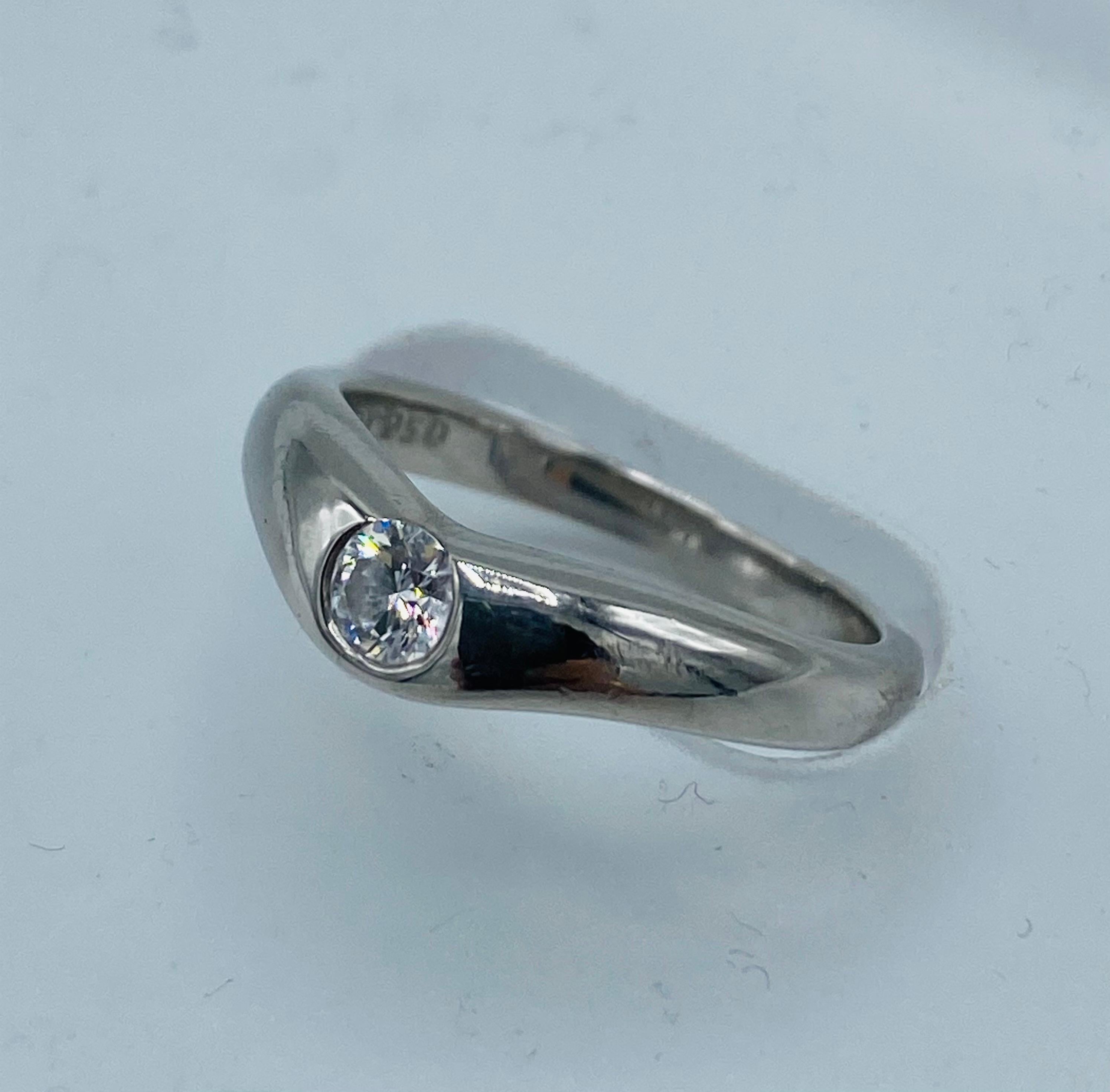 Product details:

The ring is designed by Elsa Peretti for Tiffany and Company. It is made out of 950 Platinum and approximately 0.20 cts. of round brilliant cut diamond.
the ring is signed Peretti Tiffany & Co. and it is stumped with PT. 950.
Total