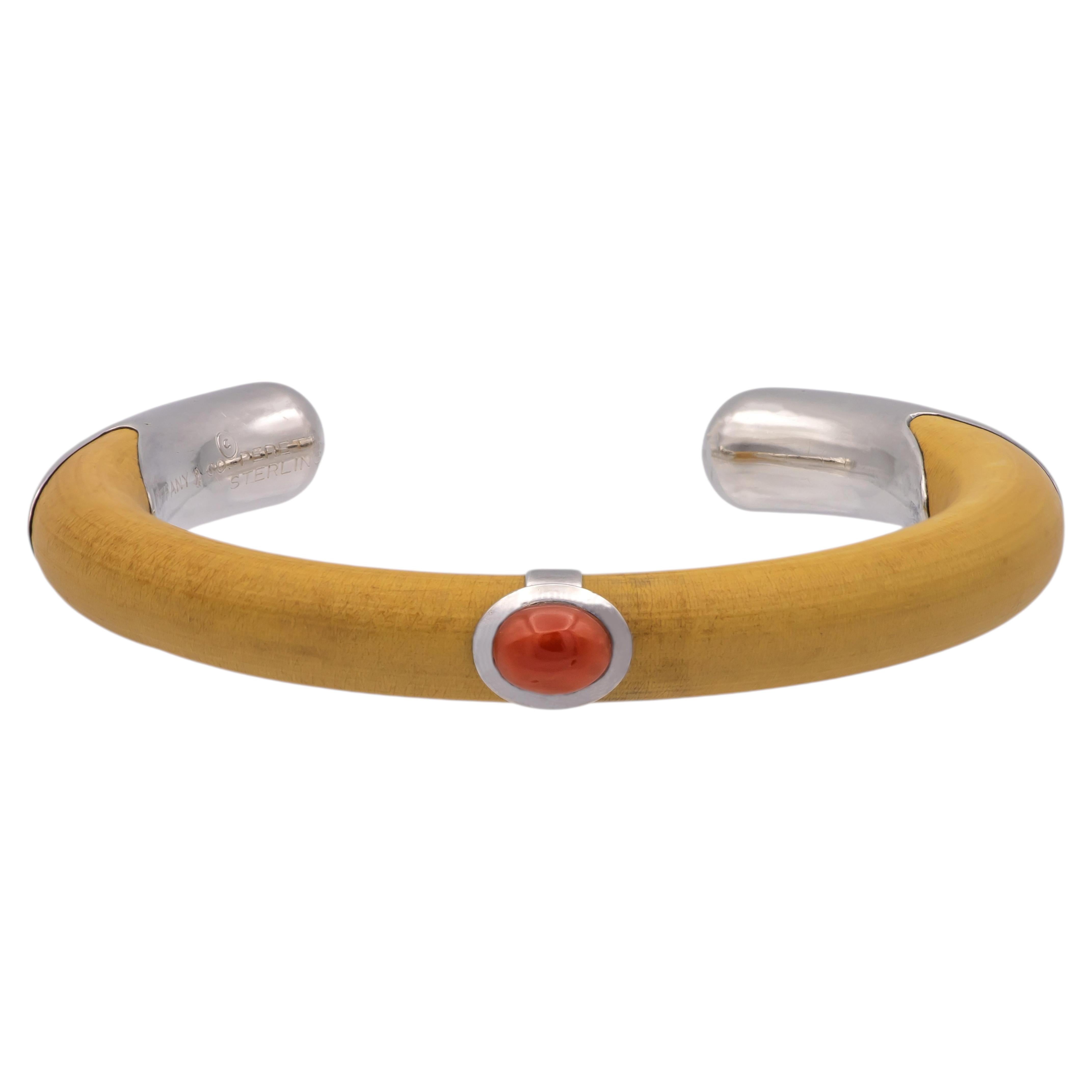 Who designed the Tiffany bone cuff?