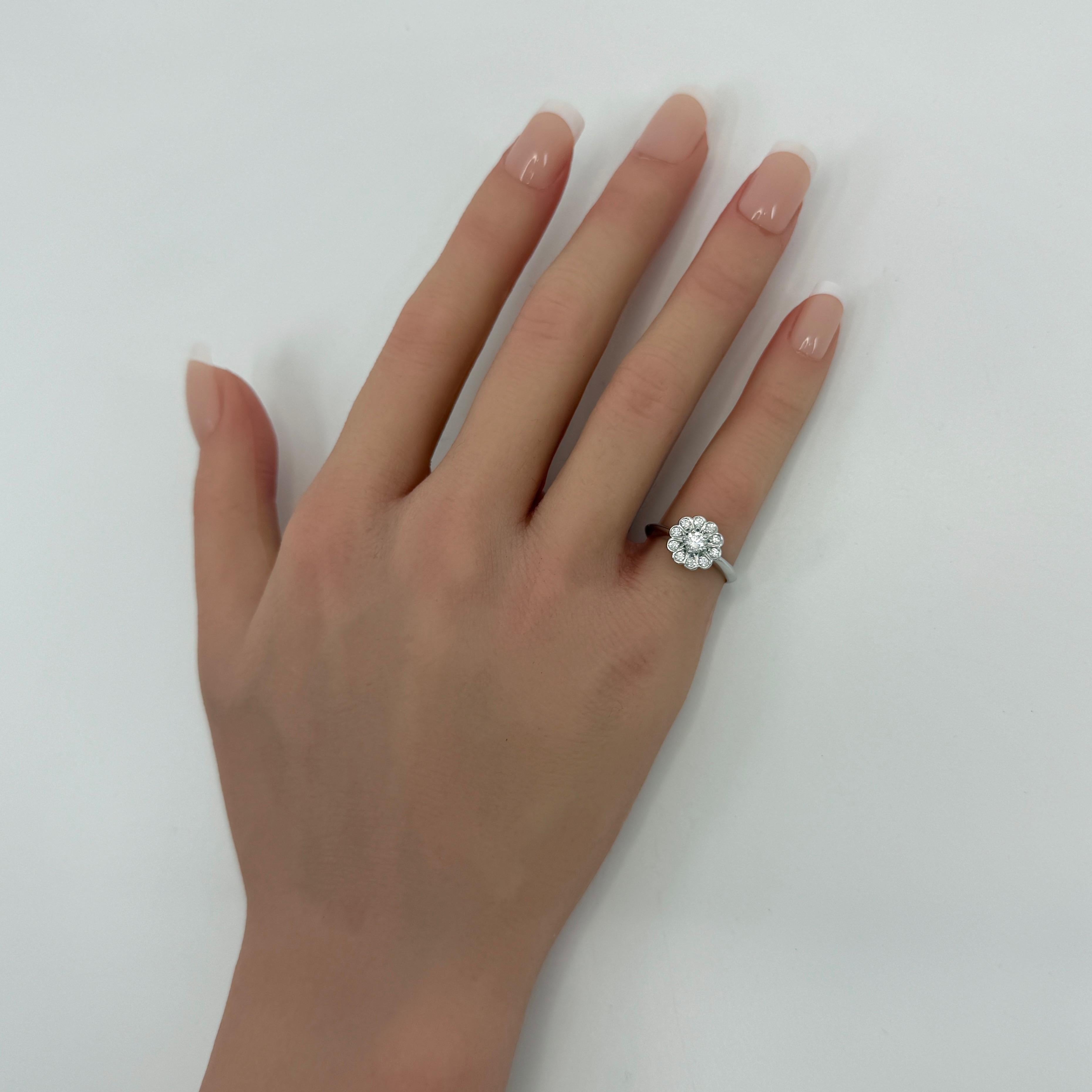 Vintage Tiffany & Co. Enchanted Flower Natural Diamond Platinum Halo Ring In Excellent Condition For Sale In Birmingham, GB