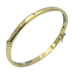 TIFFANY & Co., Vintage Armreif aus 18 Karat Gold mit Diamanten von Etoile