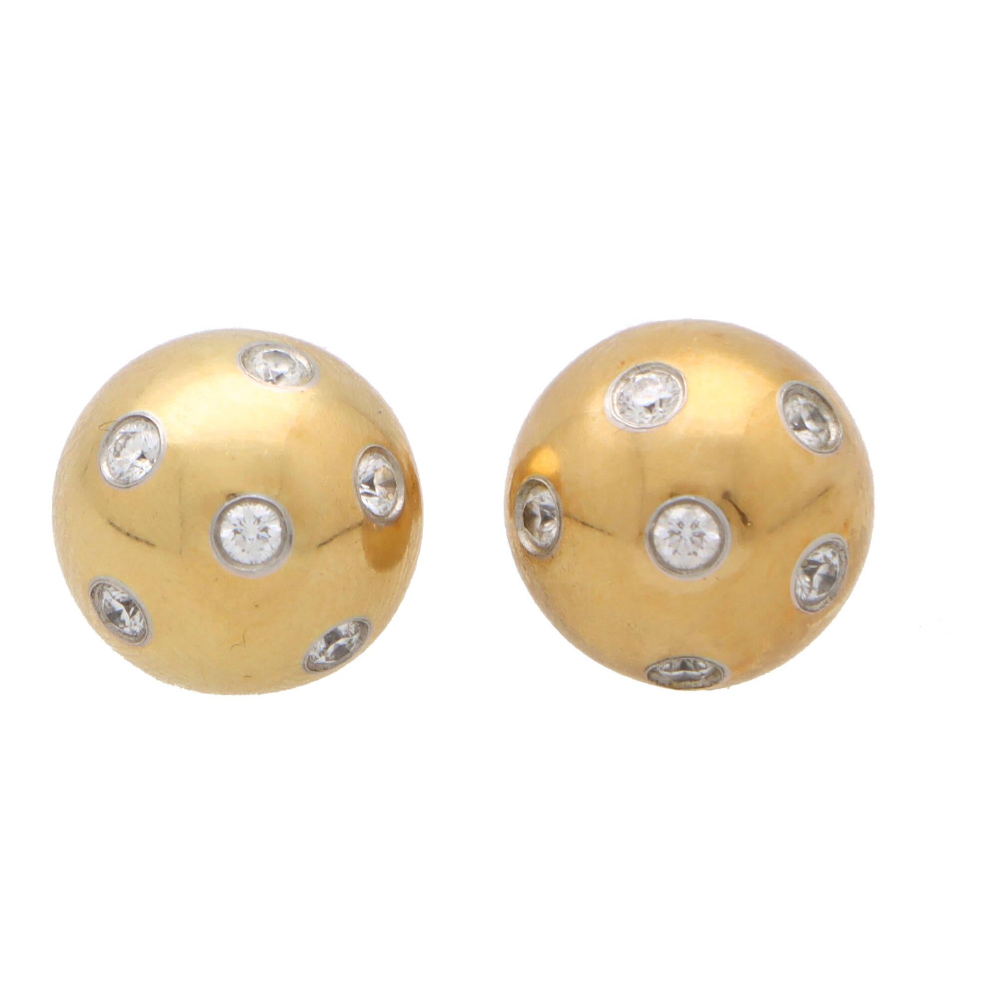 A beautiful vintage pair of Tiffany & Co. ‘Etoile’ diamond earrings set in platinum and 18k yellow gold.

From the now discontinued ‘Etoile’ collection, each earring depicts a yellow gold ball, rub over set with six round brilliant cut diamonds.